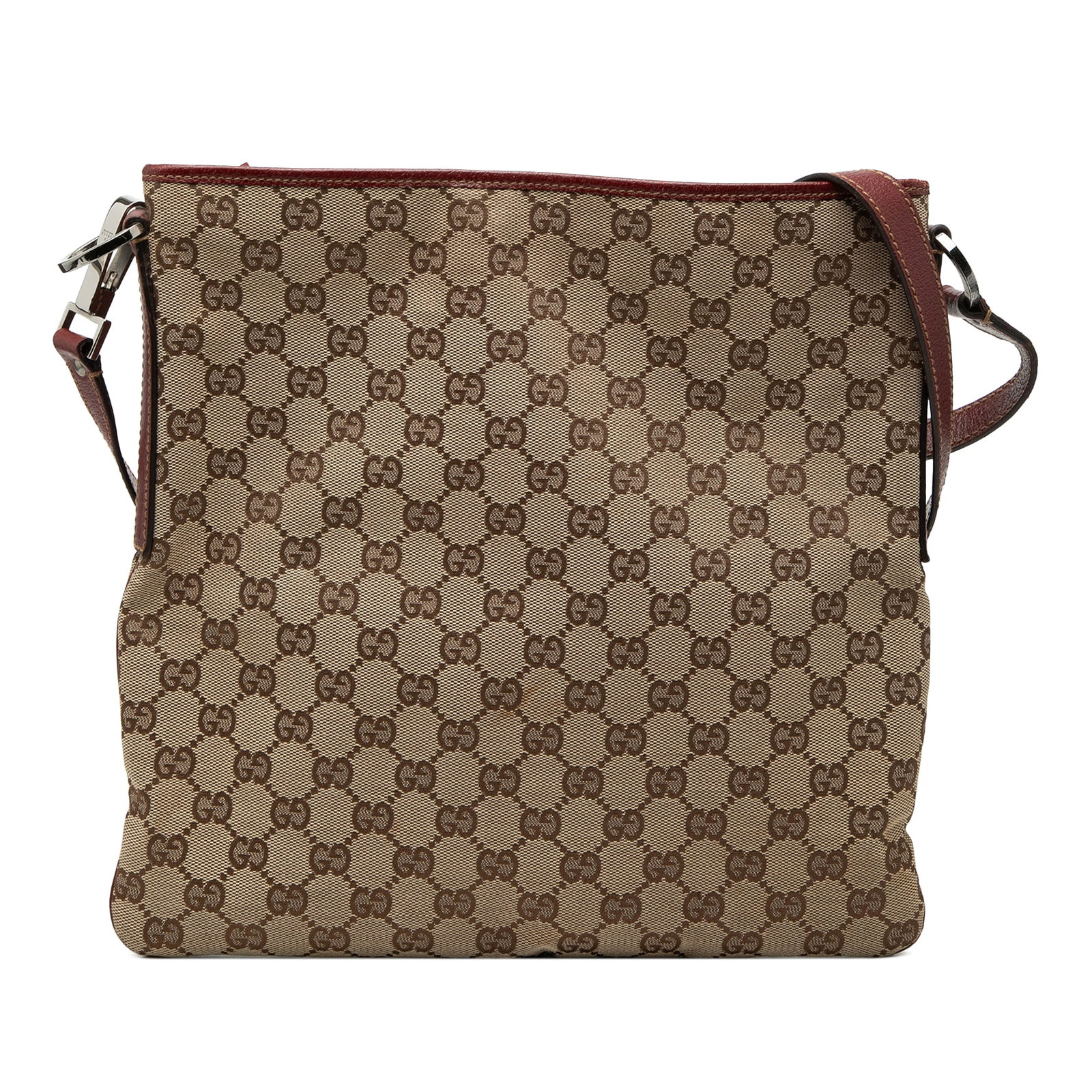 Gucci GG Canvas Beige Crossbody Bag: Gucci GG Canvas Beige Crossbody Bag This Gucci GG Canvas Crossbody bag features a durable canvas body with leather trim, a flat leather strap, a top zip closure, and an interior zip pocket. The bag is