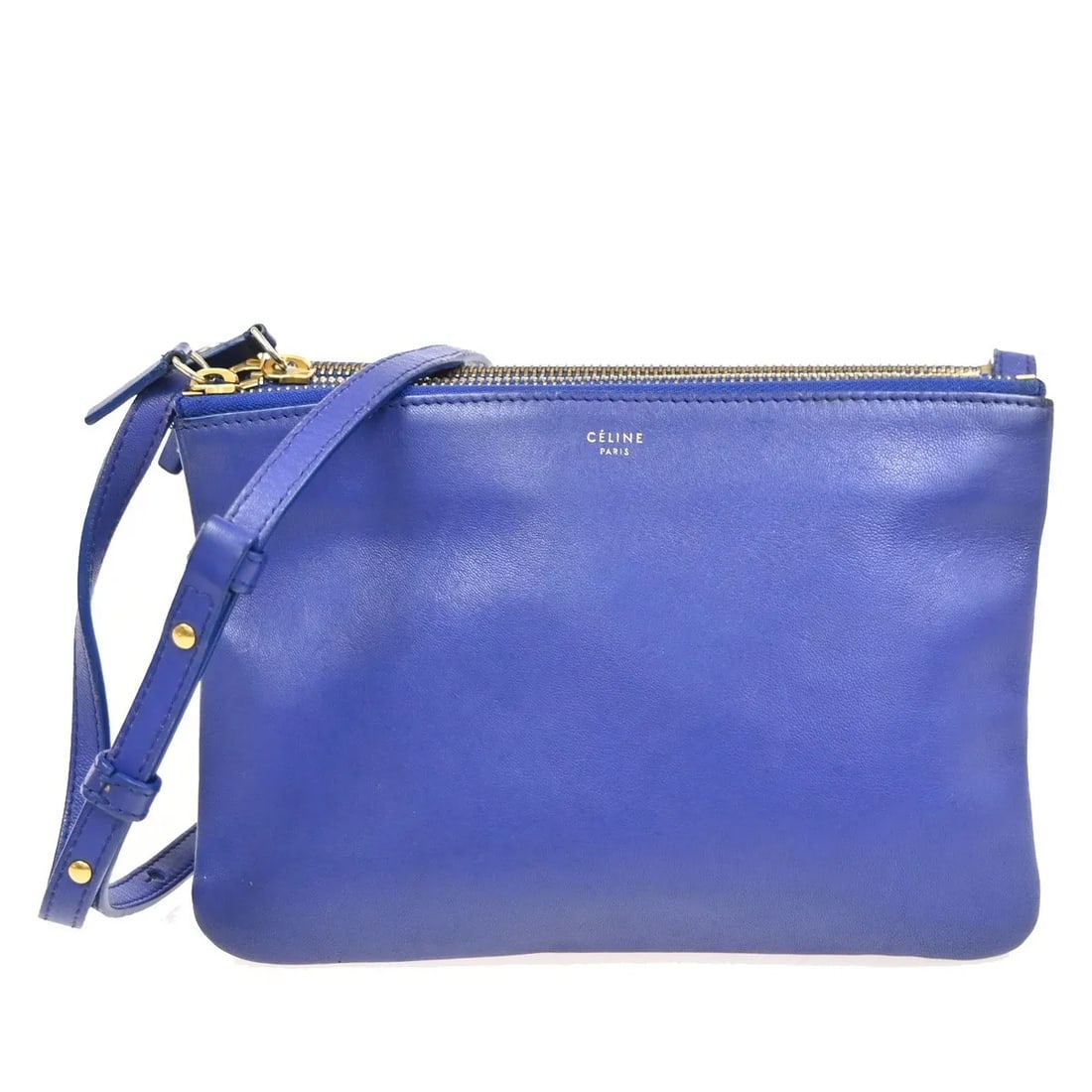Celine Trio blue leather crossbody bag Made in Italy: Celine Trio blue leather crossbody bag Made in Italy This Celine Trio Crossbody Bag is crafted from blue leather and features a compact, versatile design. Made in Italy, it is designed for women and o