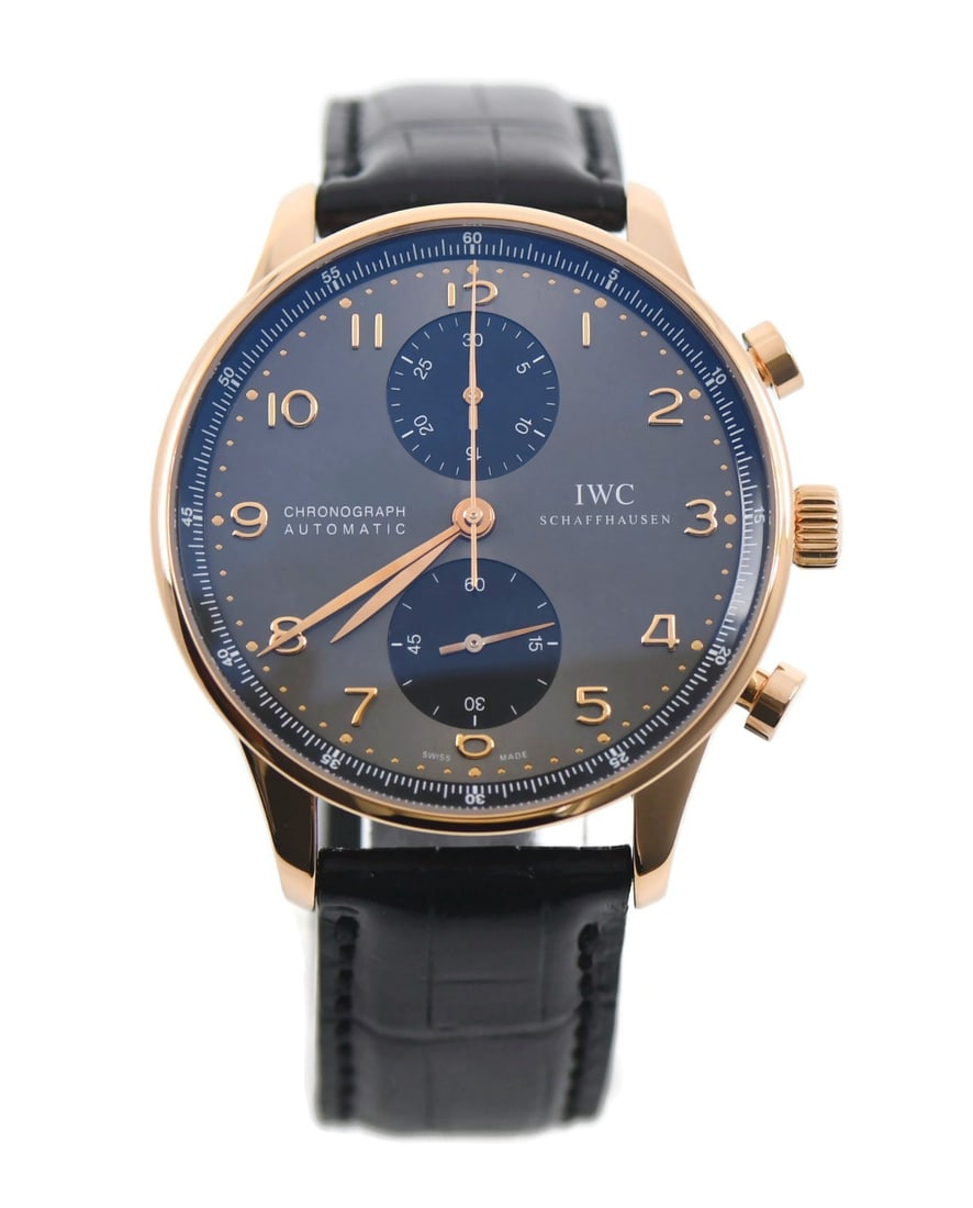 IWC Portuguese 18K Rose Gold Chronograph Wristwatch IW371482: IWC Portuguese 18K Rose Gold Chronograph Wristwatch IW371482 This IWC Portuguese Chronograph wristwatch features a 41mm round case crafted from 18K rose gold, paired with a smooth rose gold bezel. The