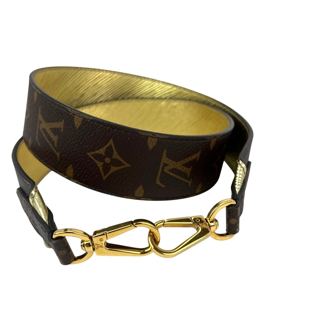 Louis Vuitton Bandouliere Monogram Epi Reversible Shoulder Strap: Louis Vuitton Bandouliere Monogram Epi Reversible Shoulder Strap This Louis Vuitton Bandouliere reversible shoulder strap is crafted from gold Epi leather with the iconic monogram pattern. Designed fo