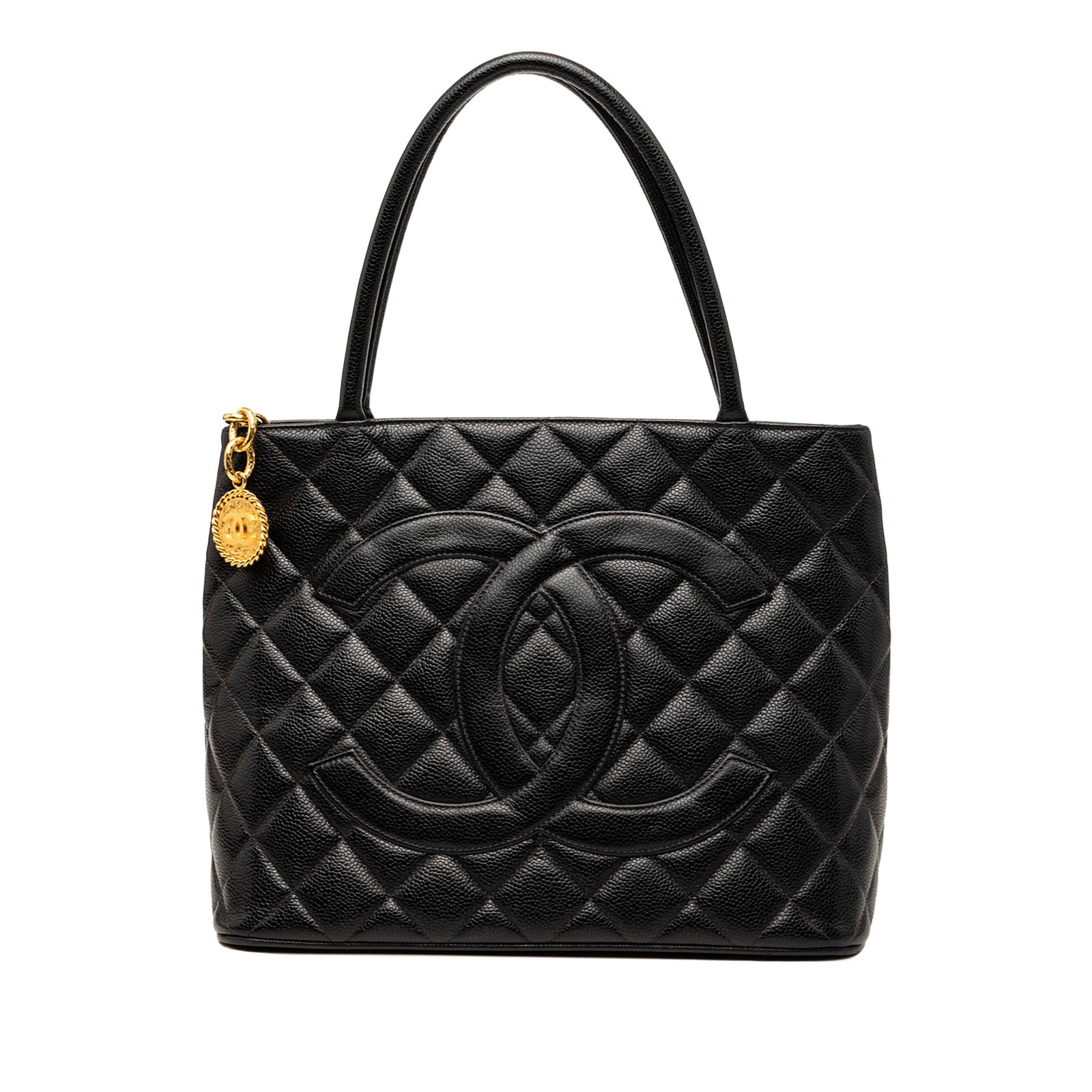 Chanel Caviar Medallion Black Quilted Leather Tote Bag: Chanel Caviar Medallion Black Quilted Leather Tote Bag This Chanel Caviar Medallion Tote is a black quilted tote bag made from caviar leather with rolled leather handles, a top zip closure, an exterio