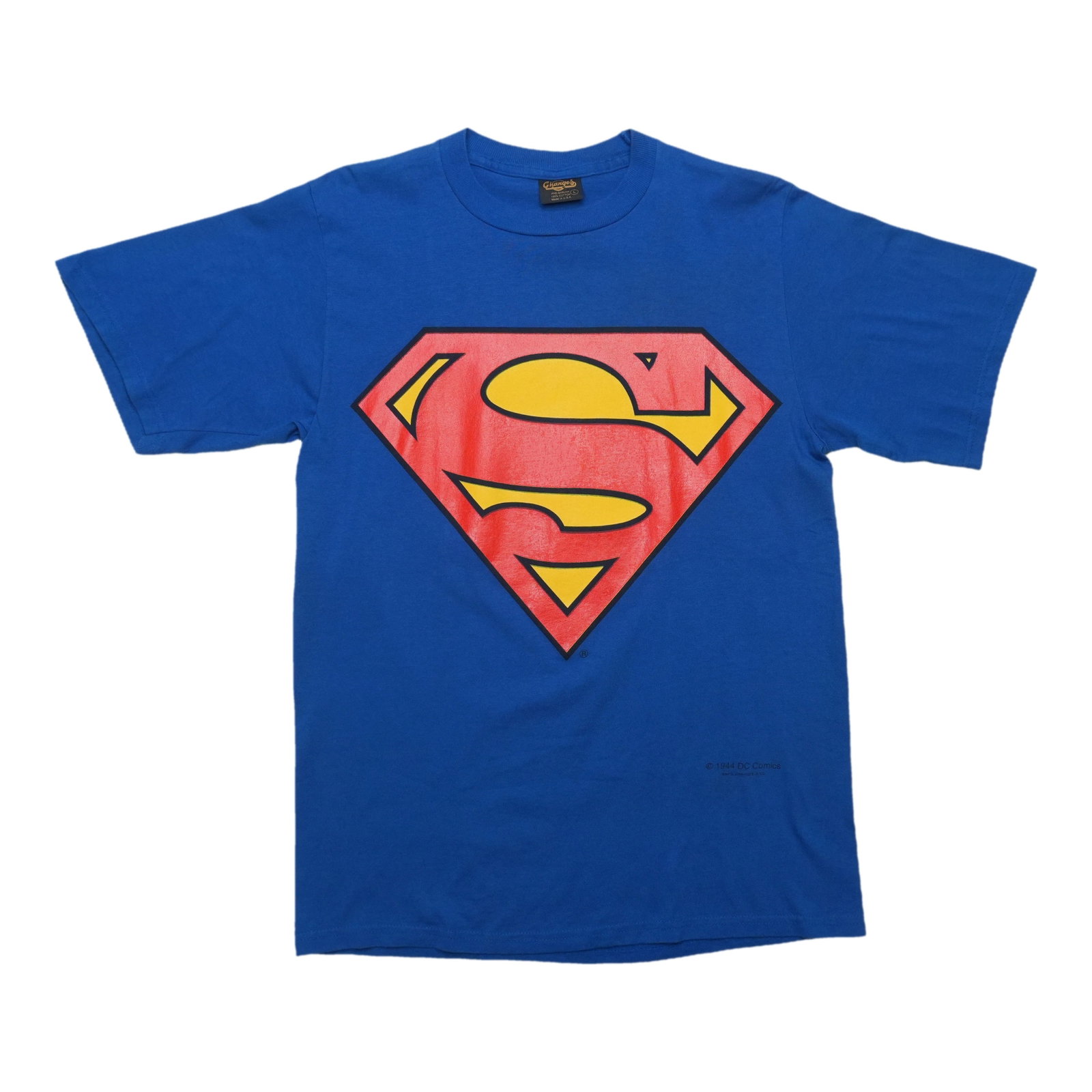 Vintage 1994 Blue Superman Logo Cotton Shirt XL: Vintage 1994 Blue Superman Logo Cotton Shirt XL This is an original vintage 1994 Superman DC Comics Logo Shirt featuring a front graphic design. Made from 100% cotton, the shirt comes in blue and is t