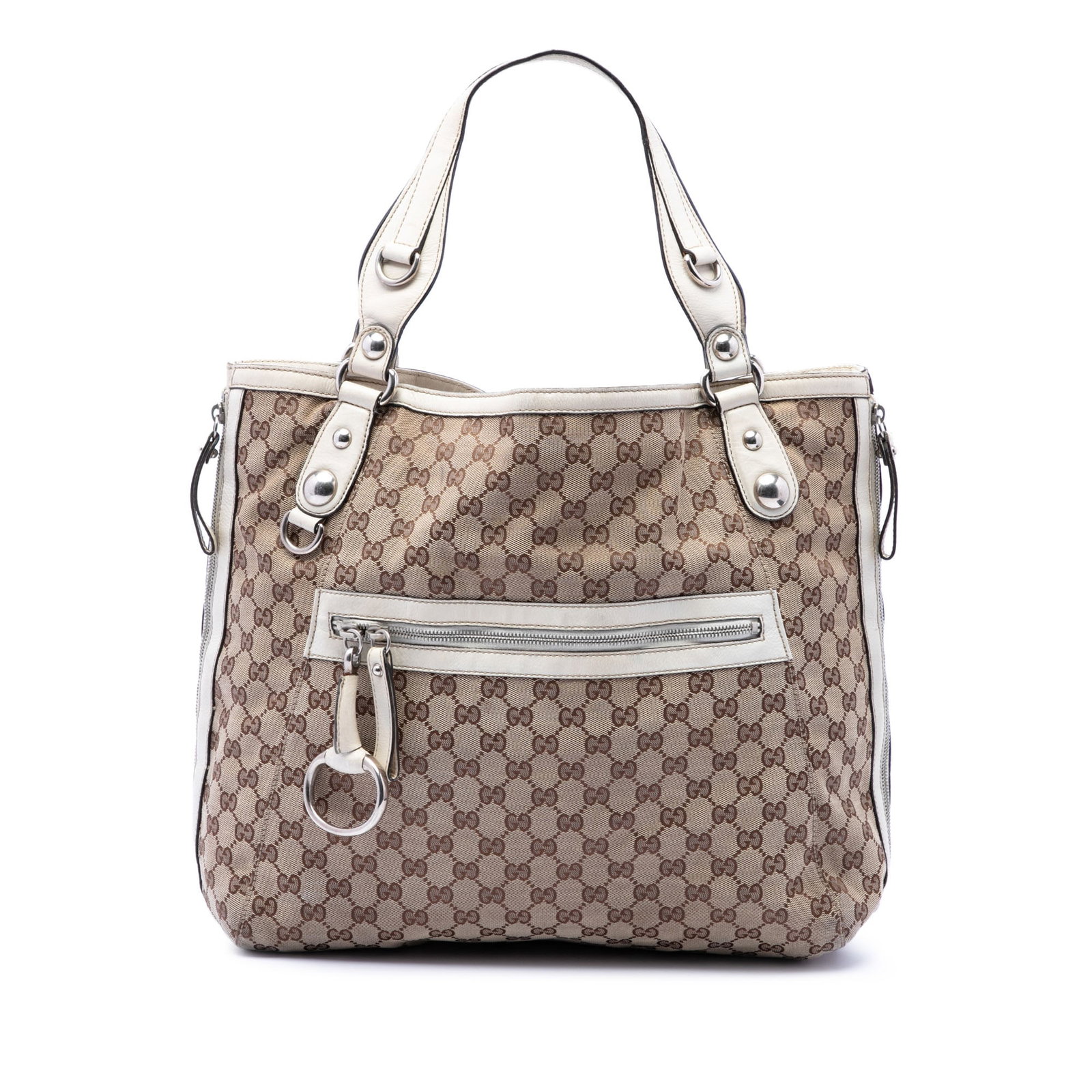 Gucci Icon Bit Zip Tote in GG Canvas with Leather Trim: Gucci Icon Bit Zip Tote in GG Canvas with Leather Trim Gucci GG Canvas Icon Bit Zip Tote in beige canvas with leather trim and side zip details. This tote features flat leather straps, an open top wit