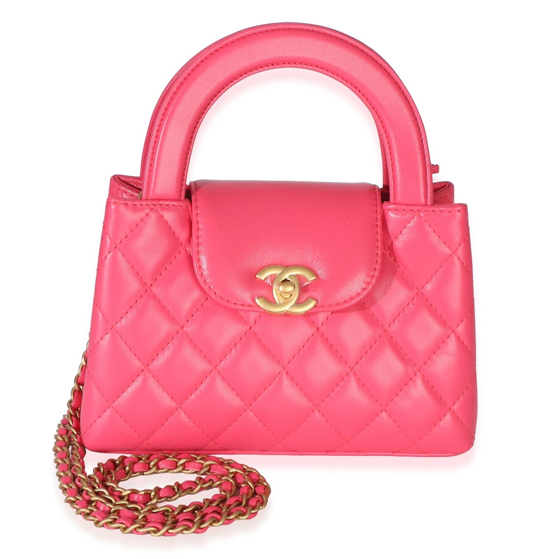 Chanel Nano Kelly Shopper Pink Quilted Leather Top Handle Bag: Chanel Nano Kelly Shopper Pink Quilted Leather Top Handle Bag Pre-owned Chanel Nano Kelly Shopper in dark pink shiny aged calfskin with a quilted finish. This unisex bag features a top handle and shou