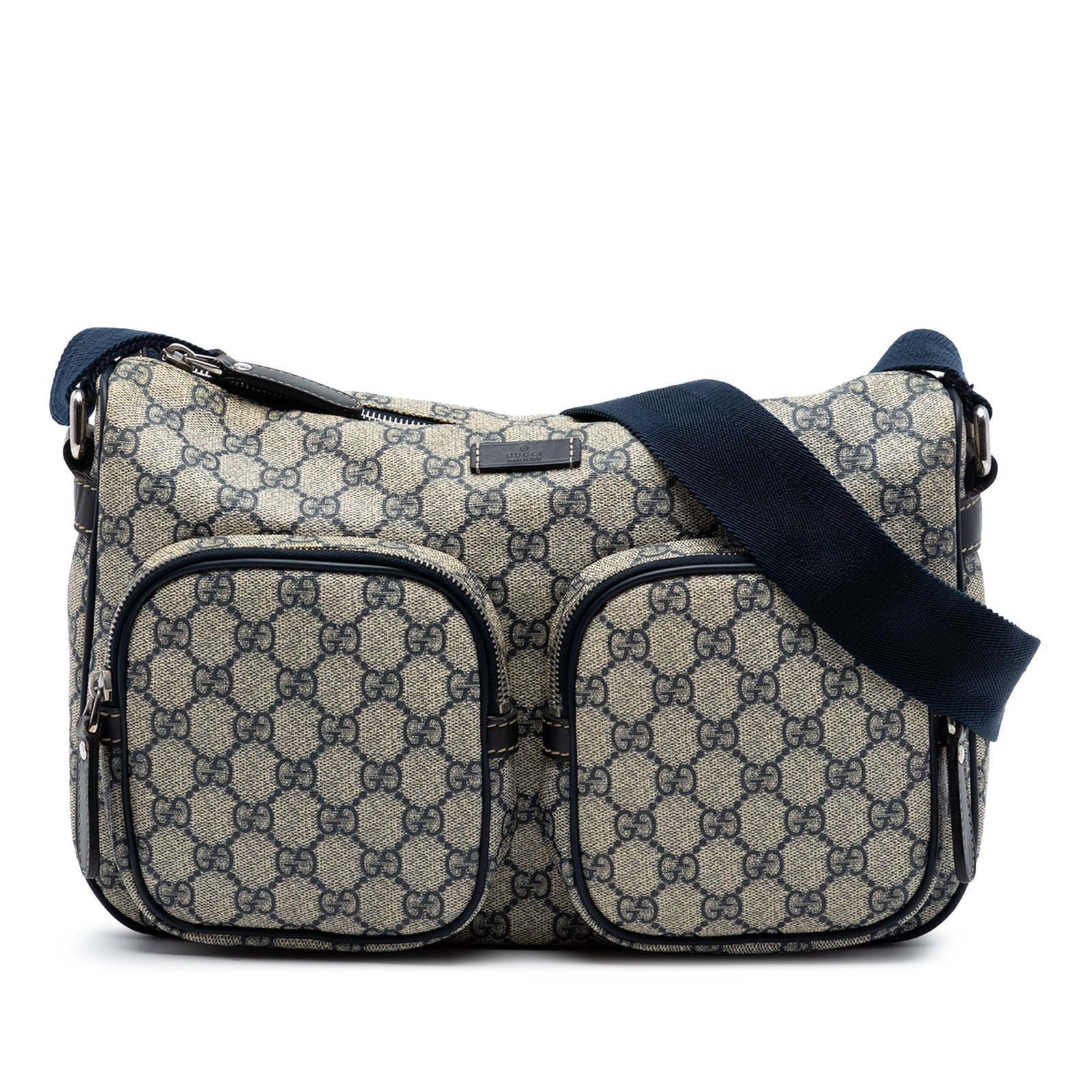 Beige GG Supreme Double Pocket Crossbody Bag by Gucci: Beige GG Supreme Double Pocket Crossbody Bag by Gucci This Gucci GG Supreme Double Pocket Crossbody bag features a coated canvas body with leather trim, an adjustable flat shoulder strap, a top zip cl