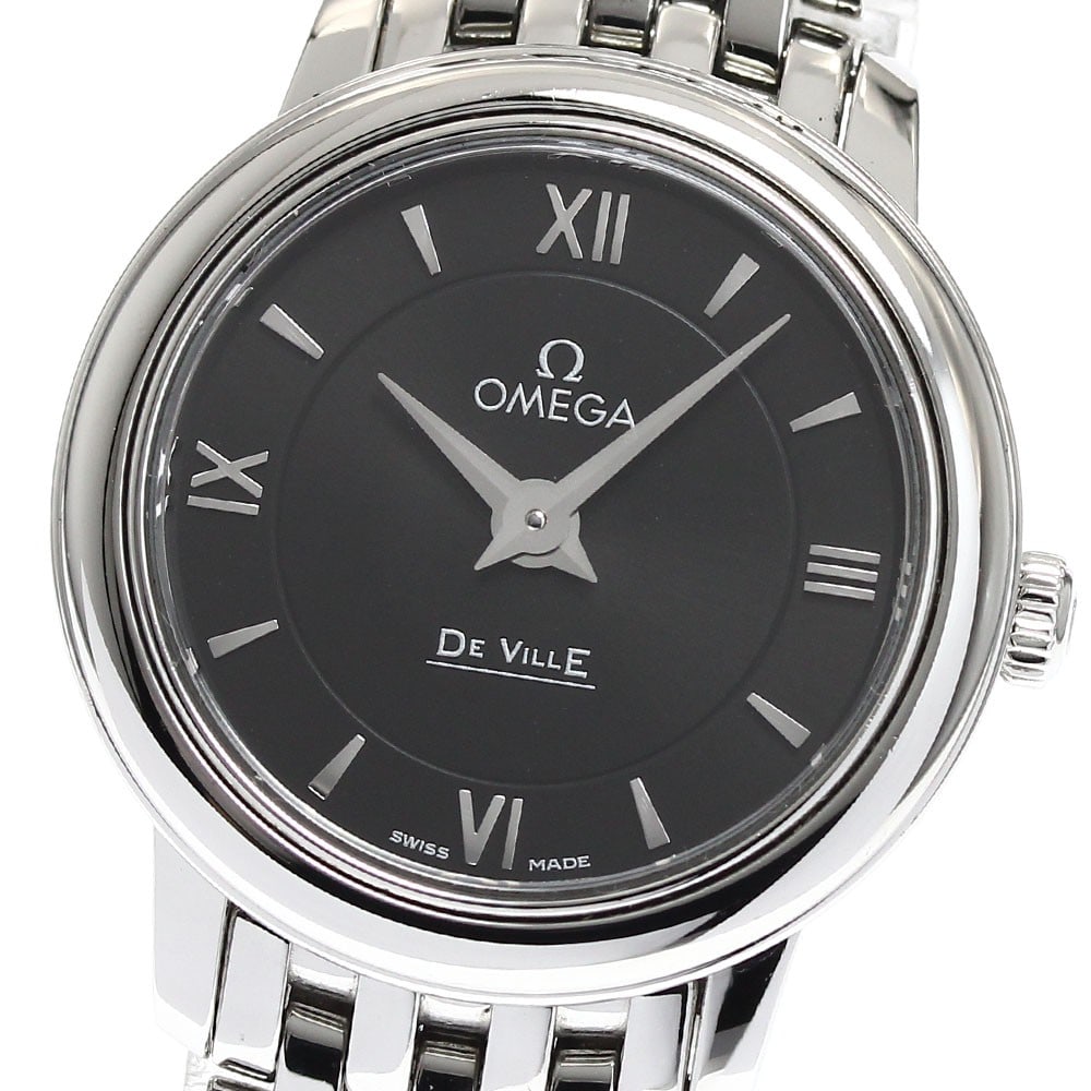 Omega De Ville Prestige quartz ladies stainless steel watch: Omega De Ville Prestige quartz ladies stainless steel watch This pre-owned OMEGA De Ville Prestige Quartz Ladies Watch features a stainless steel case and bracelet, with a refined black dial. The watc