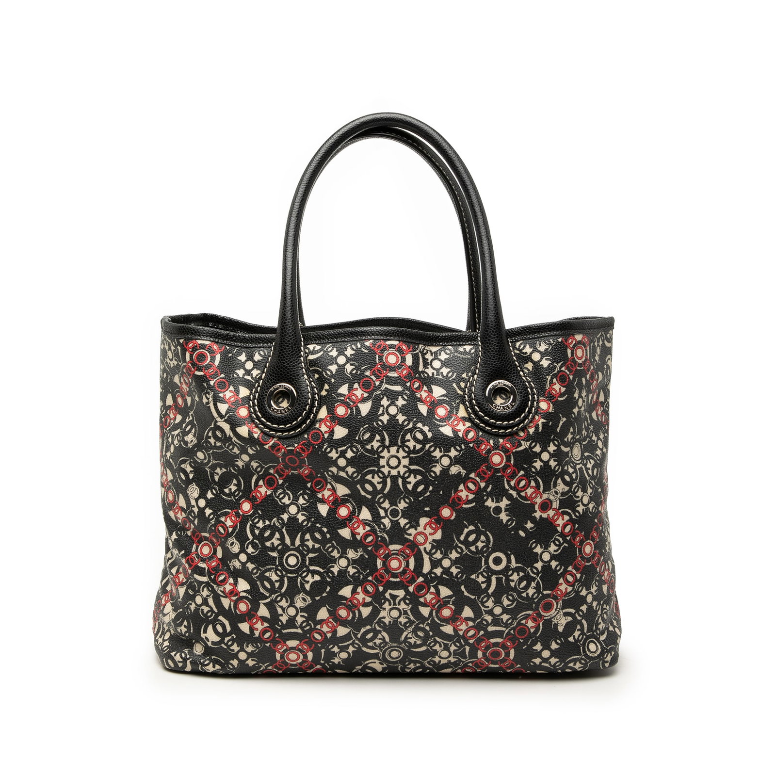 Chanel black coated canvas tote with leather trim: Chanel black coated canvas tote with leather trim This Chanel Small Coated Canvas Optic Coco Tote features a printed coated canvas body with leather trim, complemented by rolled caviar leather handles