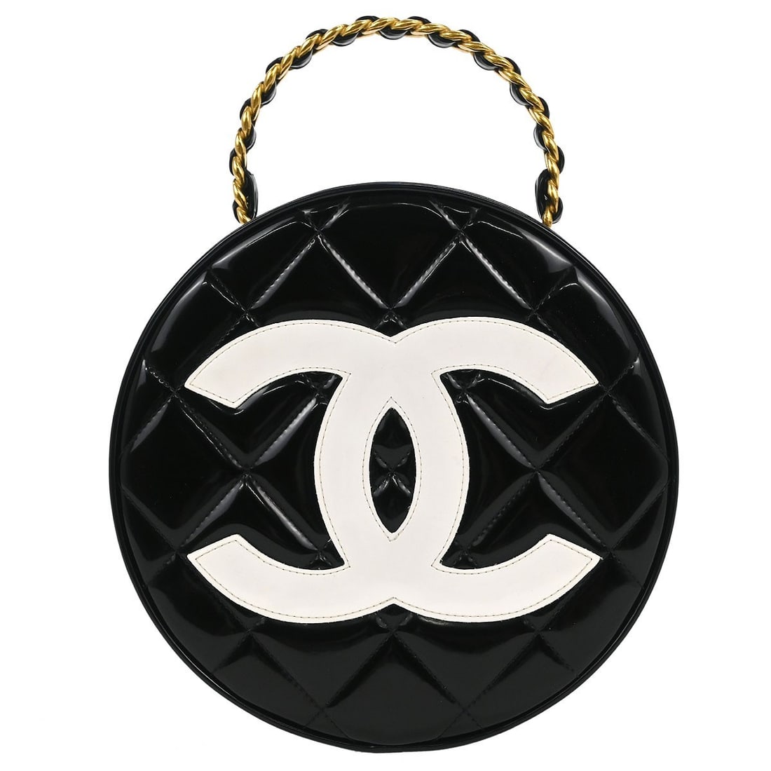 CHANEL Quilted Round Vanity Bag in Black Patent Leather: CHANEL Quilted Round Vanity Bag in Black Patent Leather Chanel round vanity handbag in black patent leather with a zip closure and top handle. This medium satchel/top handle bag from the Chanel Quilte