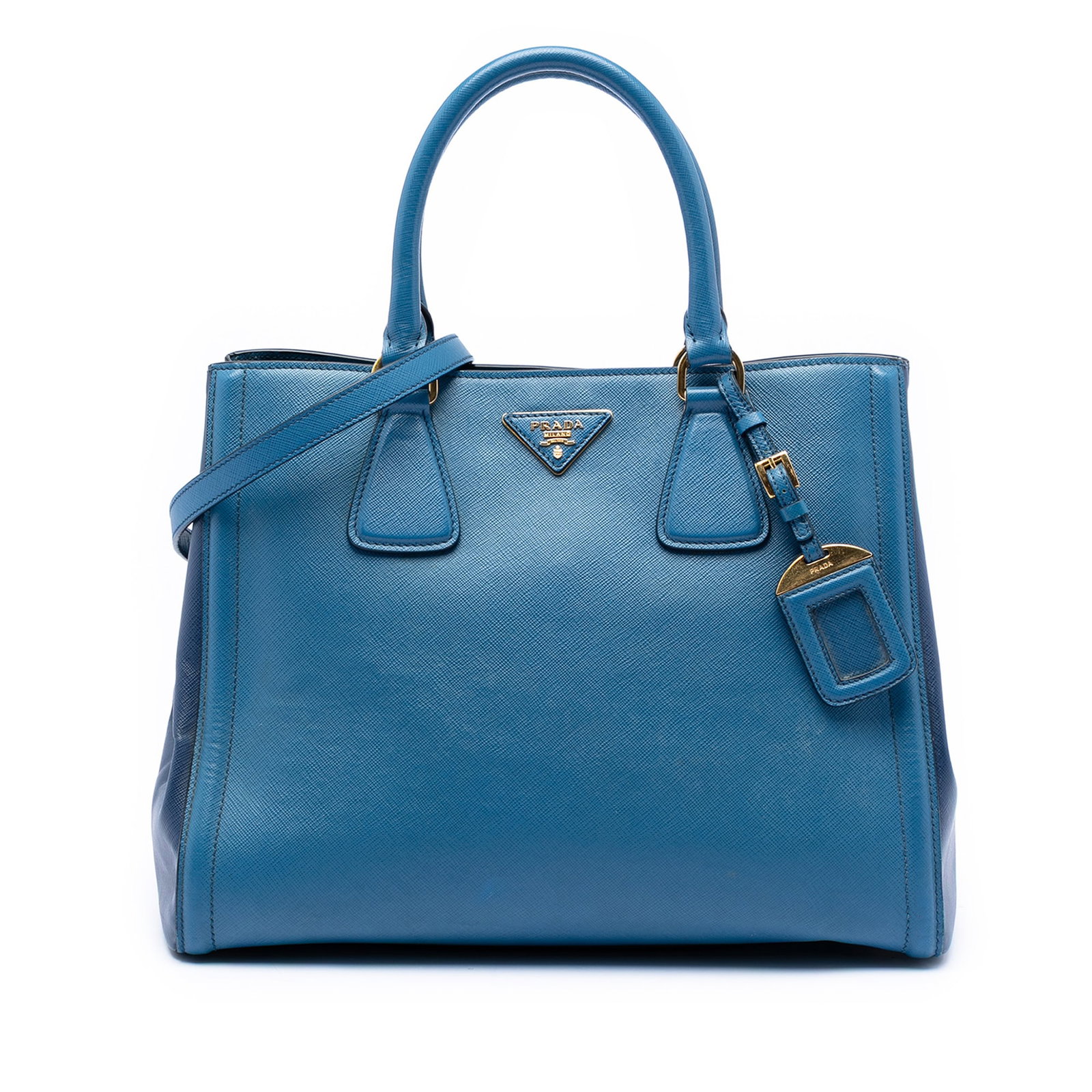 Prada Galleria Satchel in Blue Saffiano Leather with Detachable Strap: Prada Galleria Satchel in Blue Saffiano Leather with Detachable Strap This Prada Bicolor Saffiano Lux Galleria Satchel is crafted from saffiano leather and features rolled leather handles, a detachabl