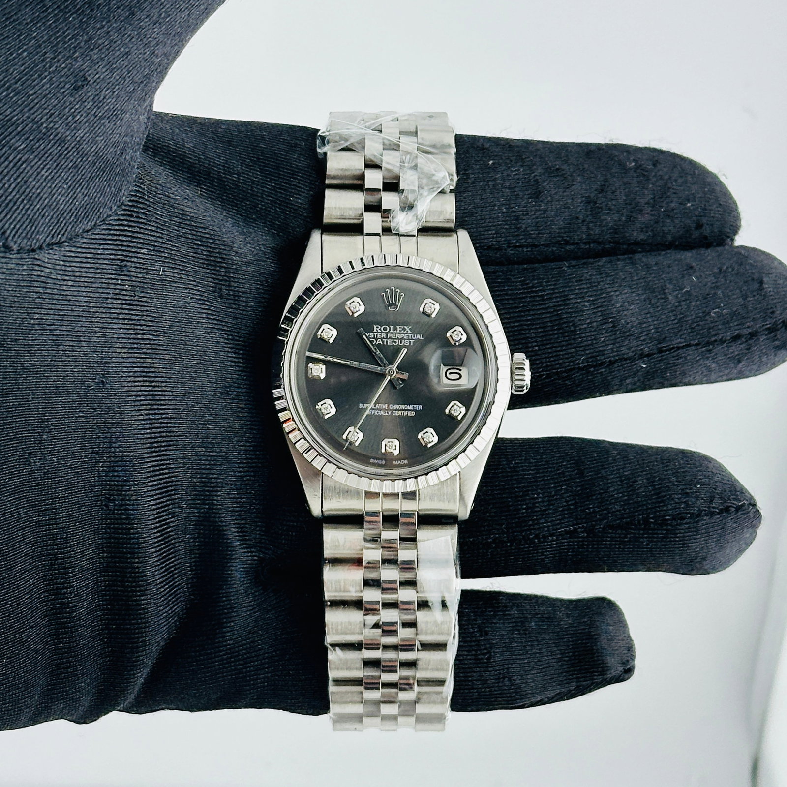 Rolex Datejust Reference 1603 Mens Watch With Aftermarket Slate Diamond Dial: Rolex Datejust Reference 1603 Mens Watch With Aftermarket Slate Diamond Dial This Rolex Datejust features a grey or slate diamond dial and is fitted with an aftermarket Jubilee bracelet. The watch is 