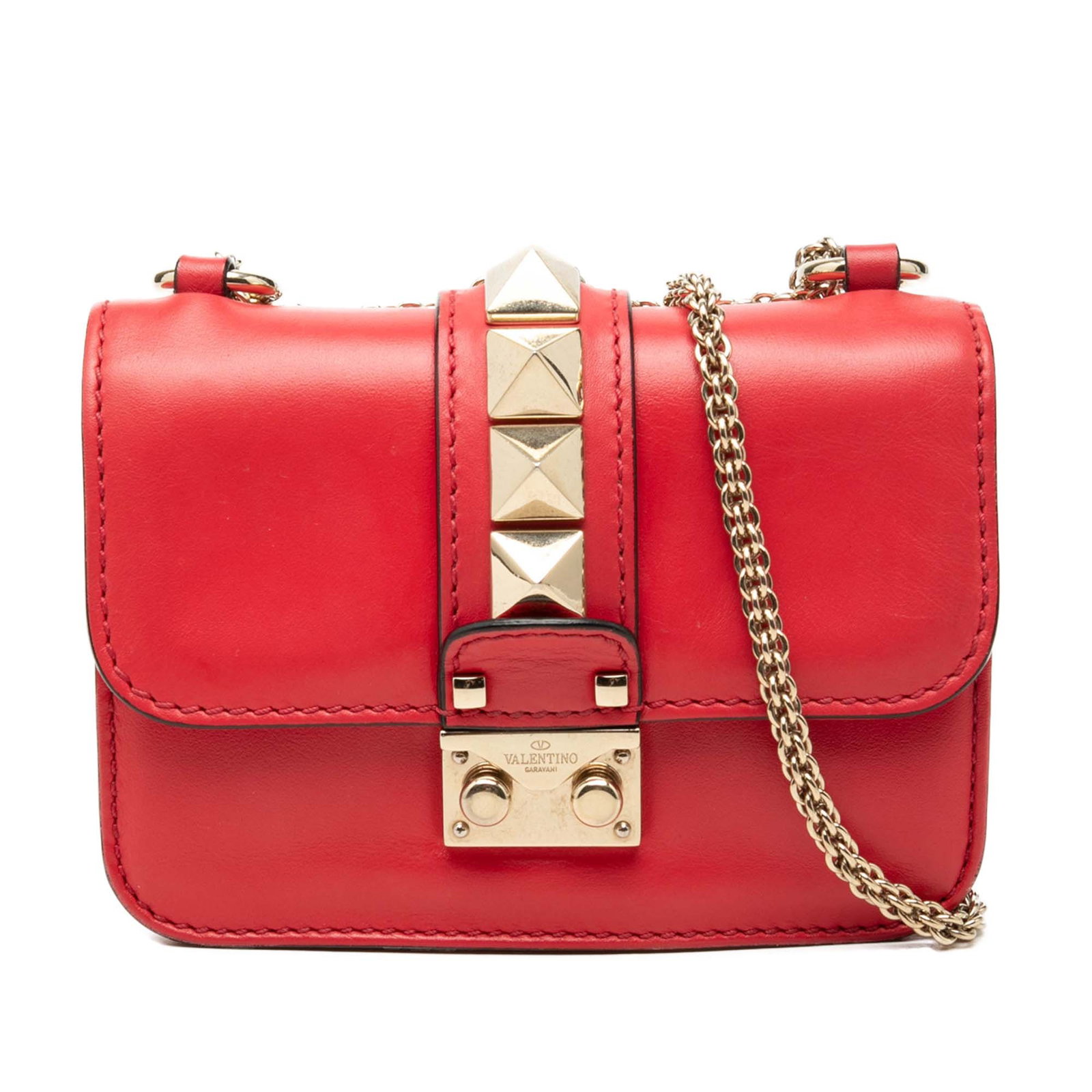Valentino Rockstud Glam Lock Mini Leather Crossbody Bag Red: Valentino Rockstud Glam Lock Mini Leather Crossbody Bag Red Valentino Mini Leather Rockstud Glam Lock Crossbody bag in red leather, made in Italy. It features a chain strap, a front flap with push loc