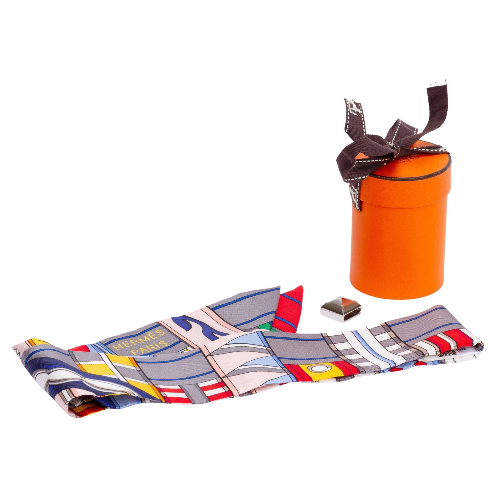 Hermes Medor Twilly Silk Scarf Geometric Print with Ring: Hermes Medor Twilly Silk Scarf Geometric Print with Ring Hermes Geometric Twilly scarf in grey silk with a geometric print of assorted forms and lines. This 21st-century piece comes with a scarf ring 