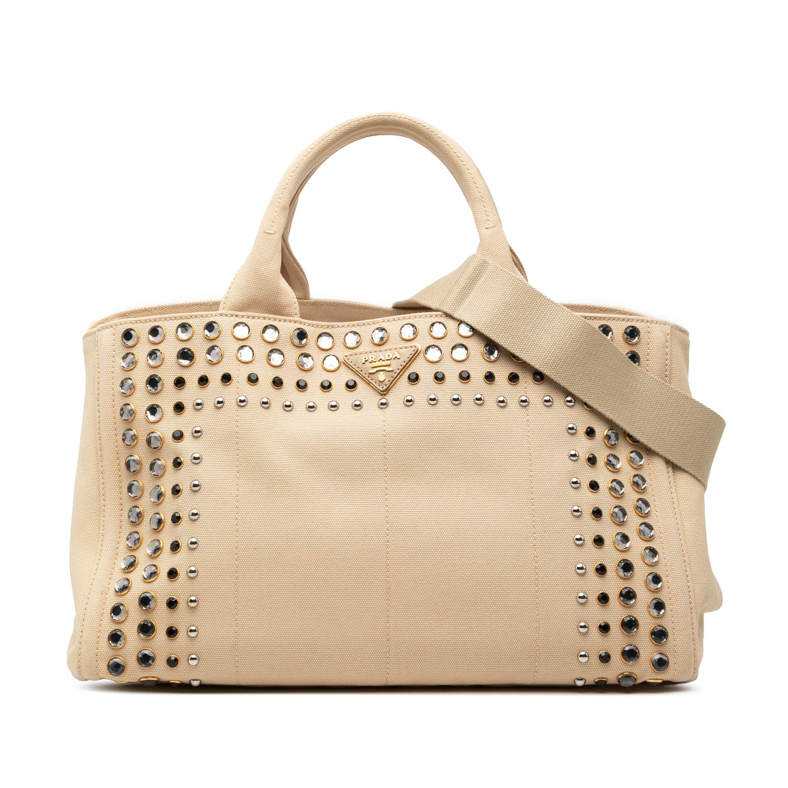 Beige Canvas Satchel with Studded Detail by Prada Canapa Bijoux: Beige Canvas Satchel with Studded Detail by Prada Canapa Bijoux This Prada Canvas Canapa Bijoux Satchel showcases a studded canvas design in beige, featuring rolled top handles, a detachable flat stra
