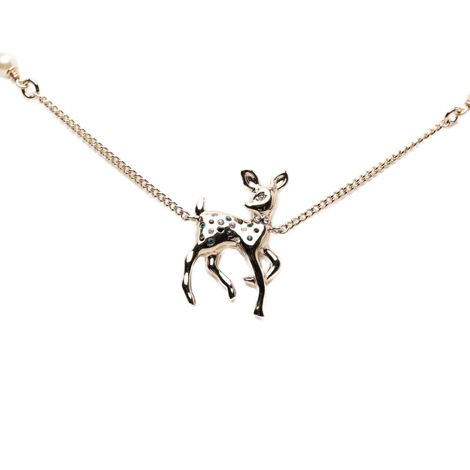 Chanel deer pendant necklace gold plated faux pearl strass: Chanel deer pendant necklace gold plated faux pearl strass This Chanel necklace features a gold plated metal body with a distinctive pendant adorned with strass details and faux pearl embellishments. 