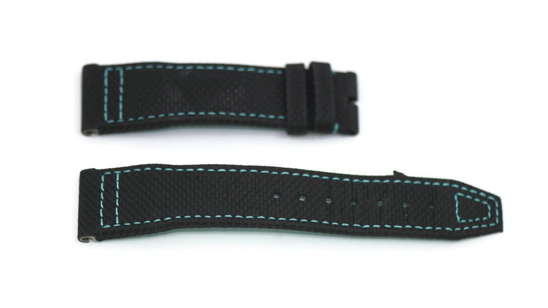 IWC Authentic Black Leather Wristwatch Band: IWC Authentic Black Leather Wristwatch Band Enhance your timepiece with this IWC Black Leather Strap, designed for ultimate comfort and style. This pre-owned wristwatch band is crafted from high-quali