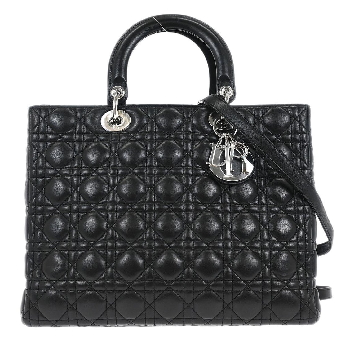 Dior Lady Dior black lambskin satchel with strap Cannage: Dior Lady Dior black lambskin satchel with strap Cannage Christian Dior Lady Dior Cannage 2-way handbag in black lambskin with quilted detailing and a zip closure. This satchel-style top handle bag fe