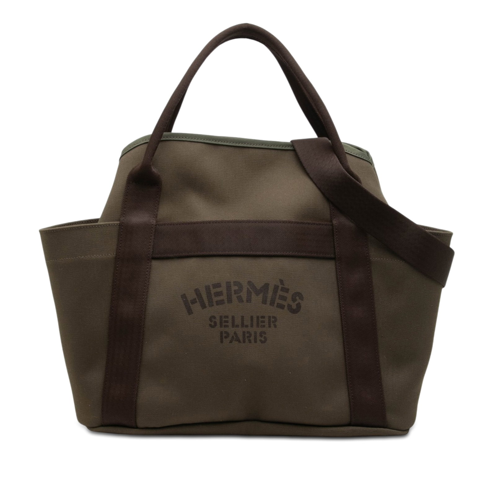 Hermes Toile Sac de Pansage Canvas Satchel with Strap: Hermes Toile Sac de Pansage Canvas Satchel with Strap Hermes Toile Sac de Pansage Grooming Bag satchel in brown fabric with a canvas body, flat canvas handles, and a detachable flat strap. It has an o
