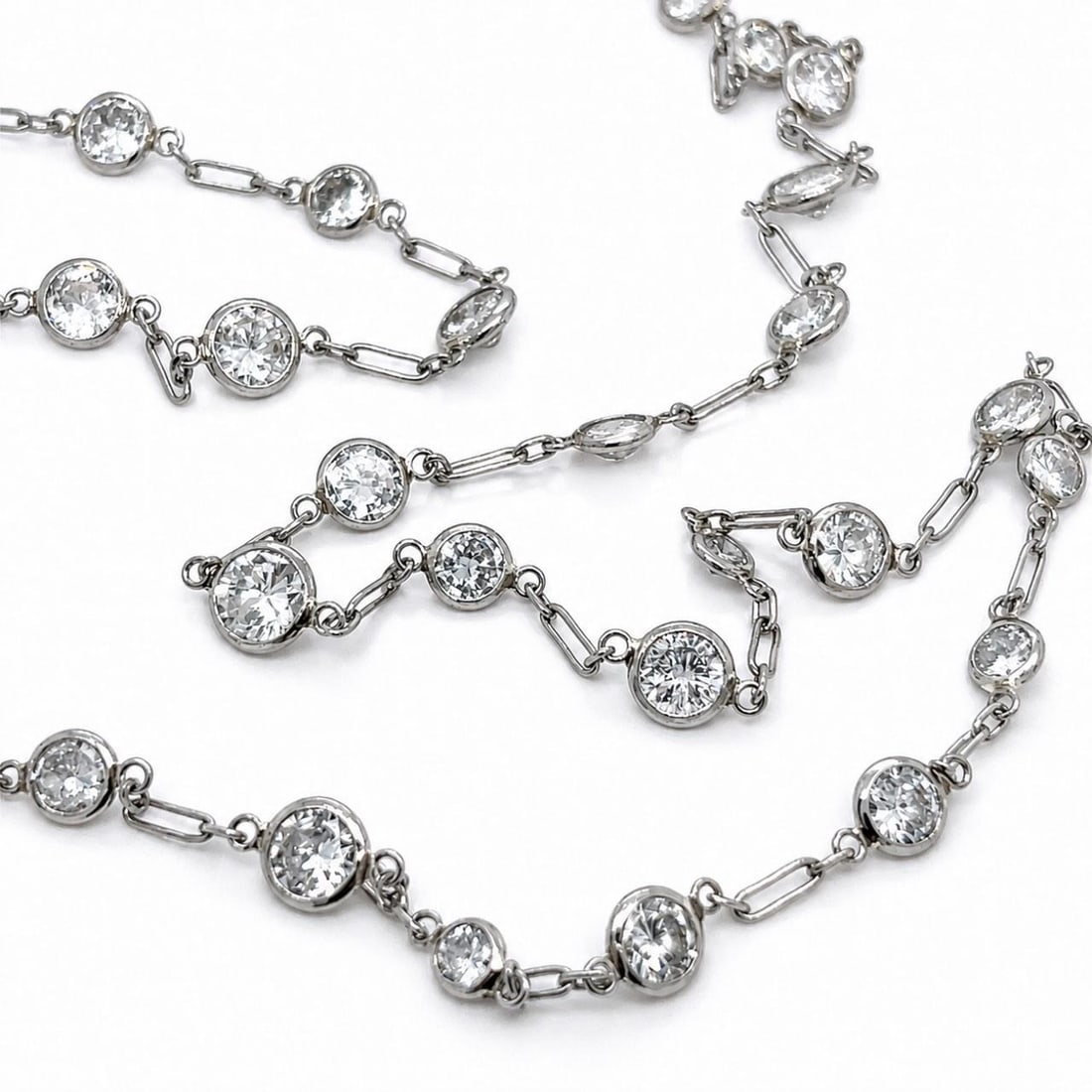 Platinum Diamond by the Yard Necklace 8.70 Ct 18 In: Platinum Diamond by the Yard Necklace 8.70 Ct 18 In Platinum diamond by the yard necklace set with 32 European-cut diamonds totaling approximately 8.70 ct. The diamonds are graded G-I color and VS2-SI