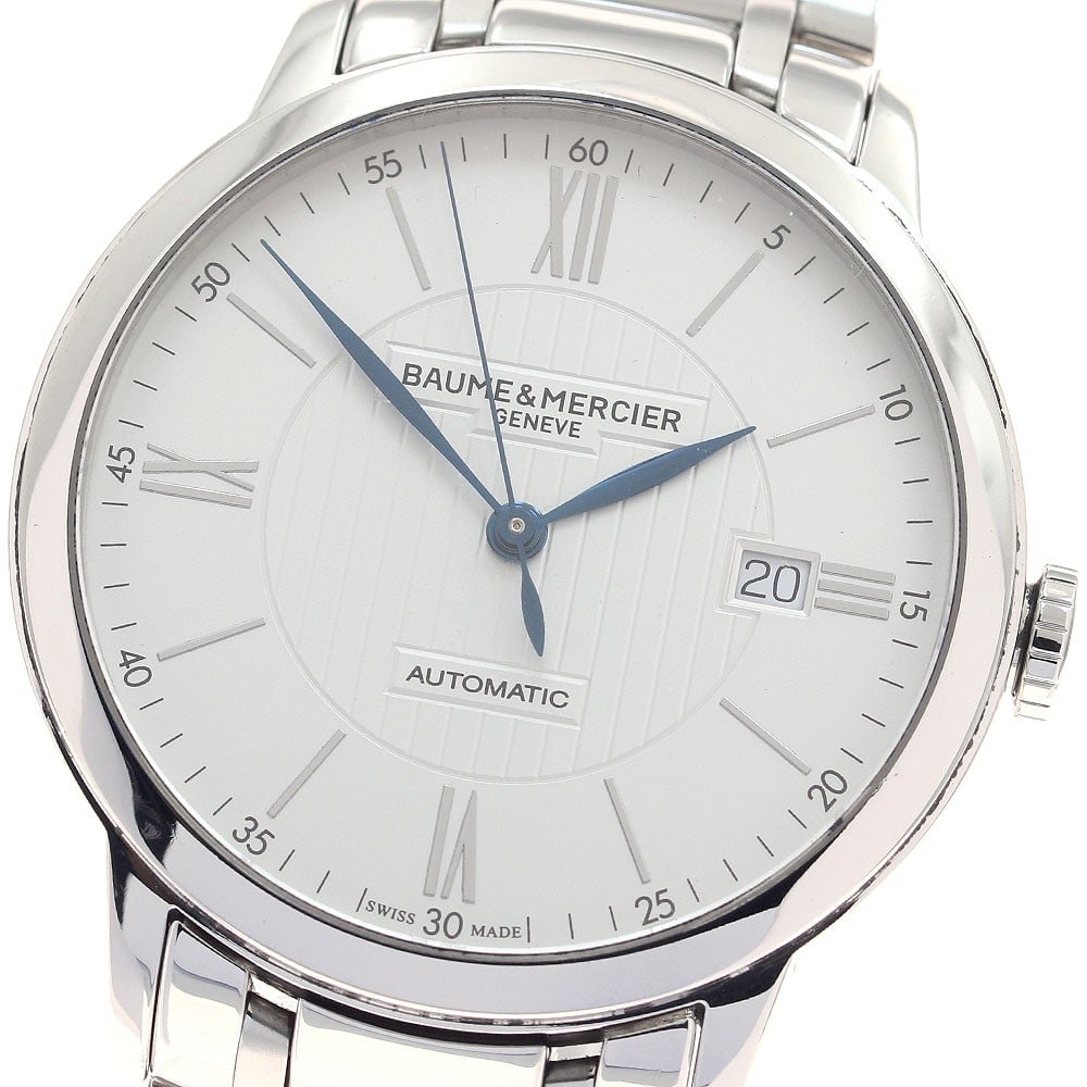 Baume & Mercier Classima 65773 Mens Automatic Date Wristwatch: Baume & Mercier Classima 65773 Mens Automatic Date Wristwatch Baume & Mercier Classima Date Automatic men's wristwatch, reference 65773. This pre-owned watch features a stainless steel case and band, 