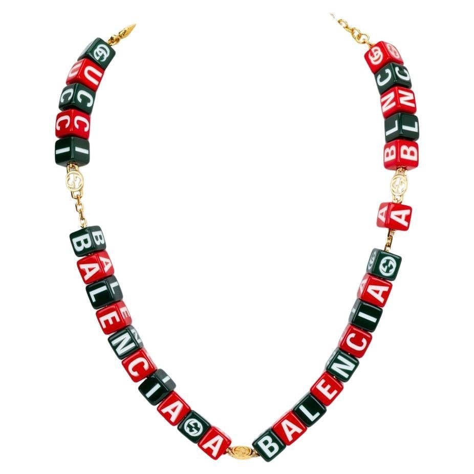 The Hacker Project Symbols Necklace by Gucci and Balenciaga with Box: The Hacker Project Symbols Necklace by Gucci and Balenciaga with Box This Gucci x Balenciaga The Hacker Project Symbols Necklace is part of the exclusive collaboration merging iconic motifs from both 