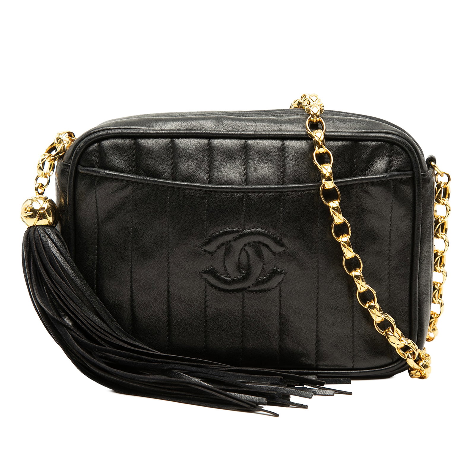 Chanel CC Tassel Camera Crossbody Bag in Black Lambskin: Chanel CC Tassel Camera Crossbody Bag in Black Lambskin This Chanel crossbody bag is crafted in lambskin leather with a quilted design and black finish. It features a ring chain strap, a top zip closu
