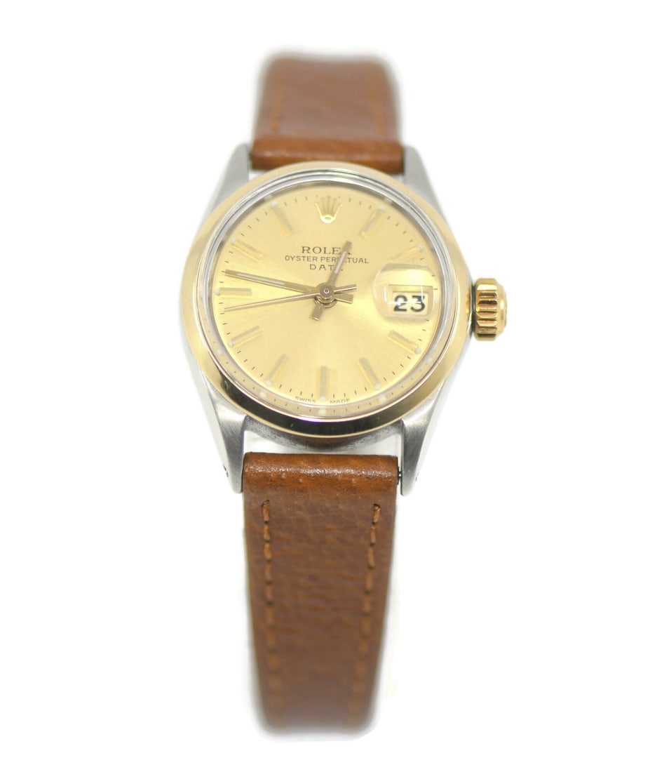 Rolex Oyster Perpetual Date Two Tone Watch Model 6516 with Box: Rolex Oyster Perpetual Date Two Tone Watch Model 6516 with Box Introducing the Rolex Oyster Perpetual Date Two Tone Stainless Steel Watch (Model: 6516). This exquisite wristwatch features a luxurious 