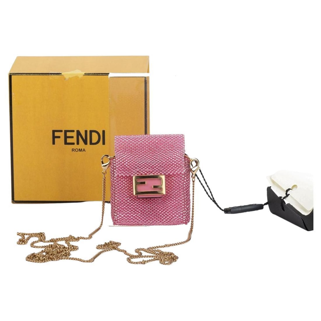 Fendi Micro Baguette Pink Bag with Gold F Clasp NIB: Fendi Micro Baguette Pink Bag with Gold F Clasp NIB This Fendi Micro Baguette in a vibrant pink hue is a stylish accessory that showcases contemporary design. Crafted in Italy, it features a unique we