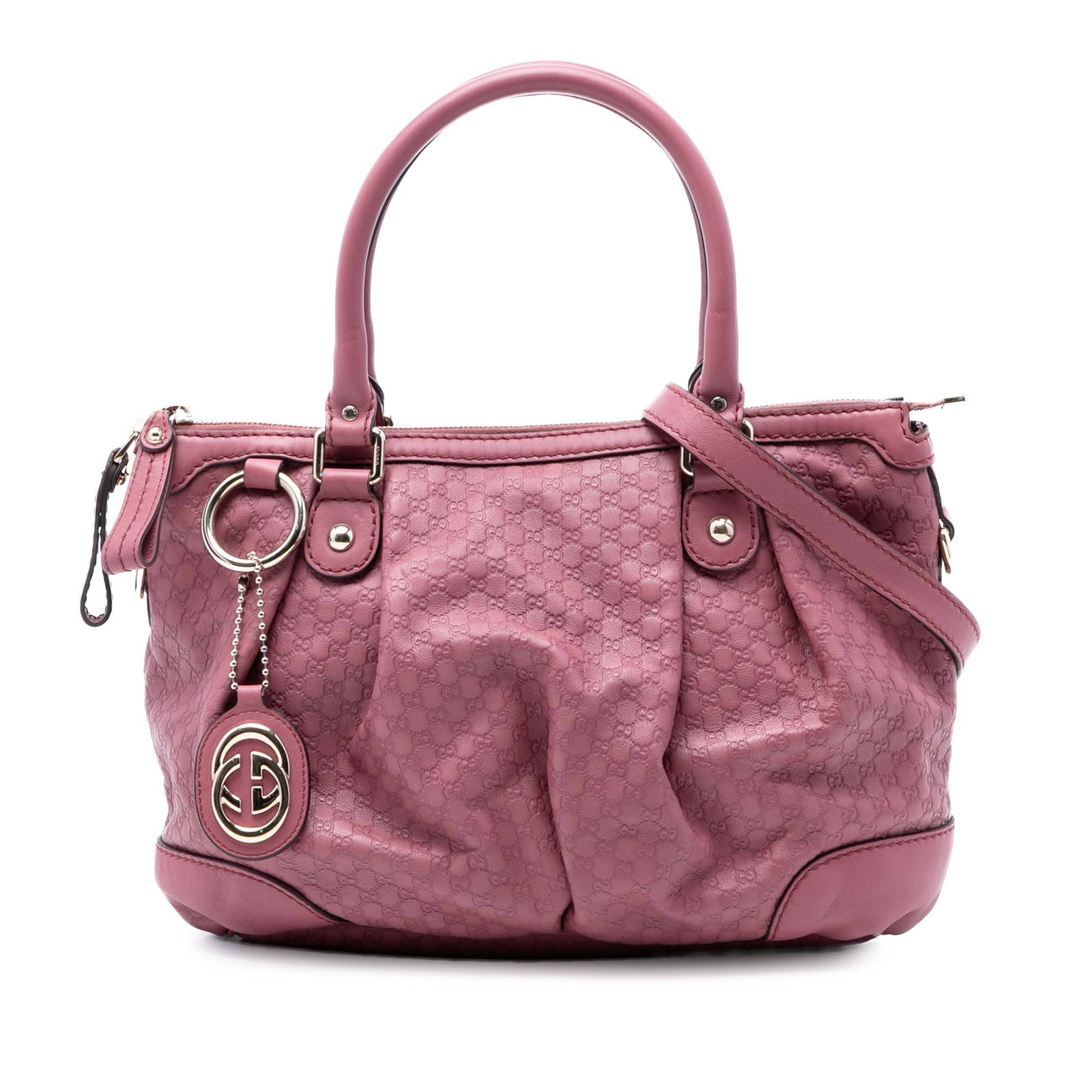 Gucci Microguccissima Pink Leather Sukey Satchel: Gucci Microguccissima Pink Leather Sukey Satchel This Gucci Microguccissima Sukey Satchel features an embossed leather body in pink, rolled leather handles, and a detachable flat leather strap. The sa