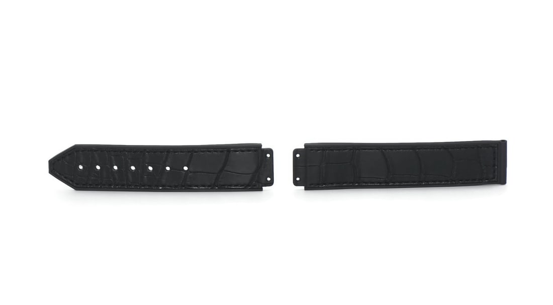 Hublot 18mm Black Leather Two Piece Watch Band: Hublot 18mm Black Leather Two Piece Watch Band Pre-owned Hublot wristwatch band in black leather, designed as a two-piece strap for men. It is compatible with Hublot watches and measures 18 mm in band