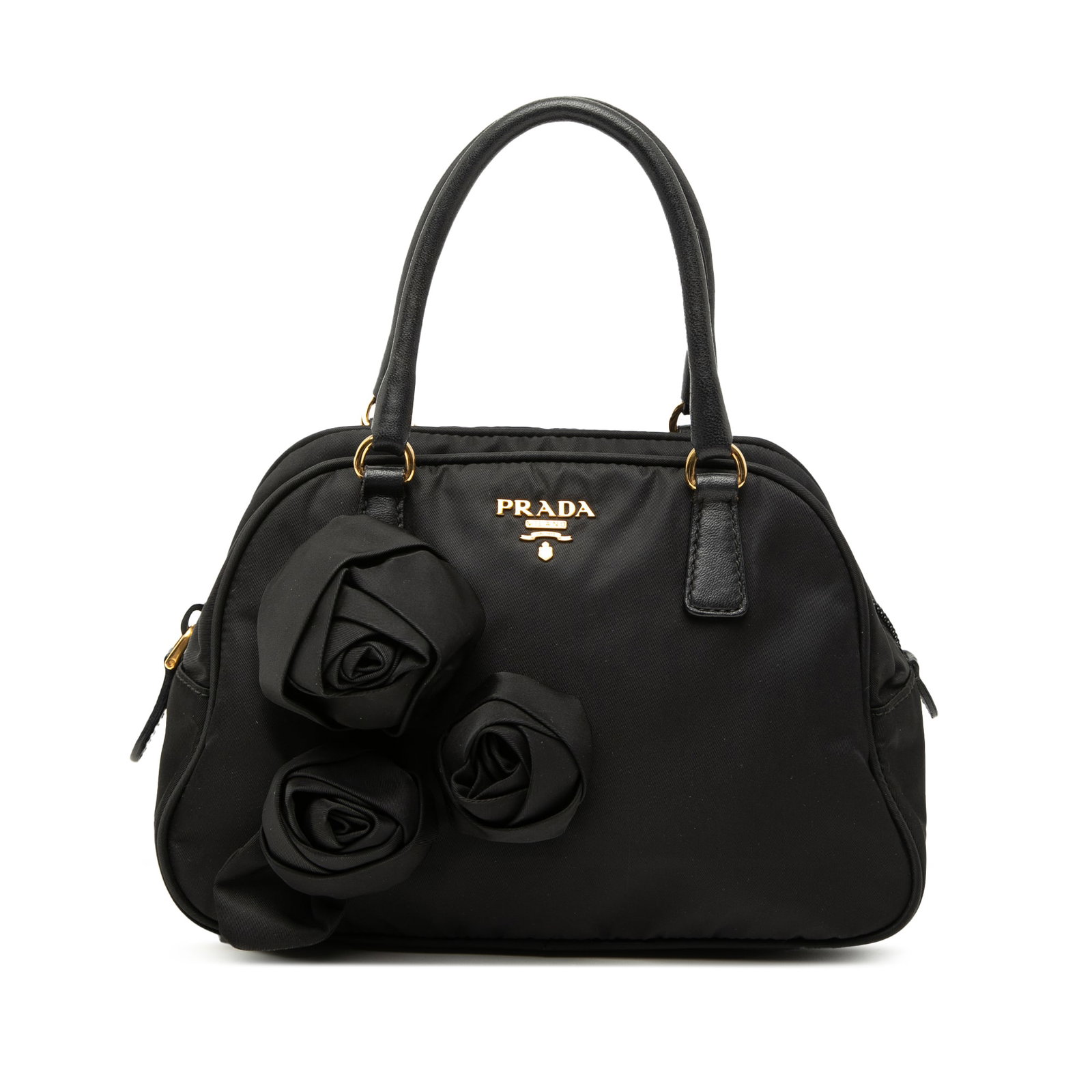 Prada Tessuto Rose Embellished Nylon Handbag Black: Prada Tessuto Rose Embellished Nylon Handbag Black A Prada Rose Embellished Tessuto handbag from Italy, crafted with a nylon body and floral details. It features rolled leather handles, a top zip clos