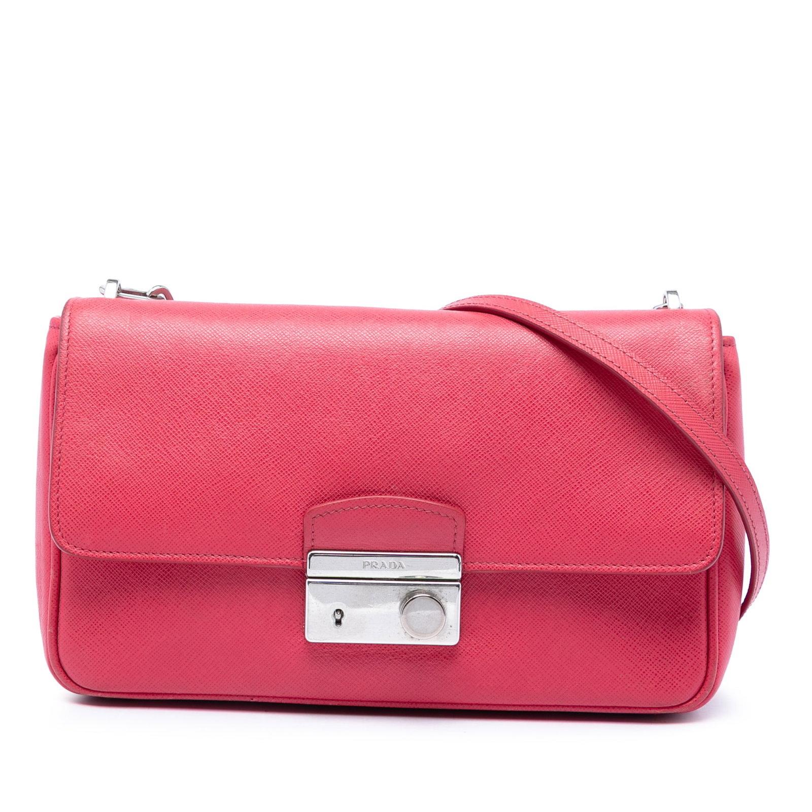 Prada Saffiano Sound Lock Leather Crossbody Bag Pink: Prada Saffiano Sound Lock Leather Crossbody Bag Pink Prada Saffiano Sound Lock Crossbody bag in pink leather, made in Italy. It features a saffiano leather body, an adjustable flat leather and chain s