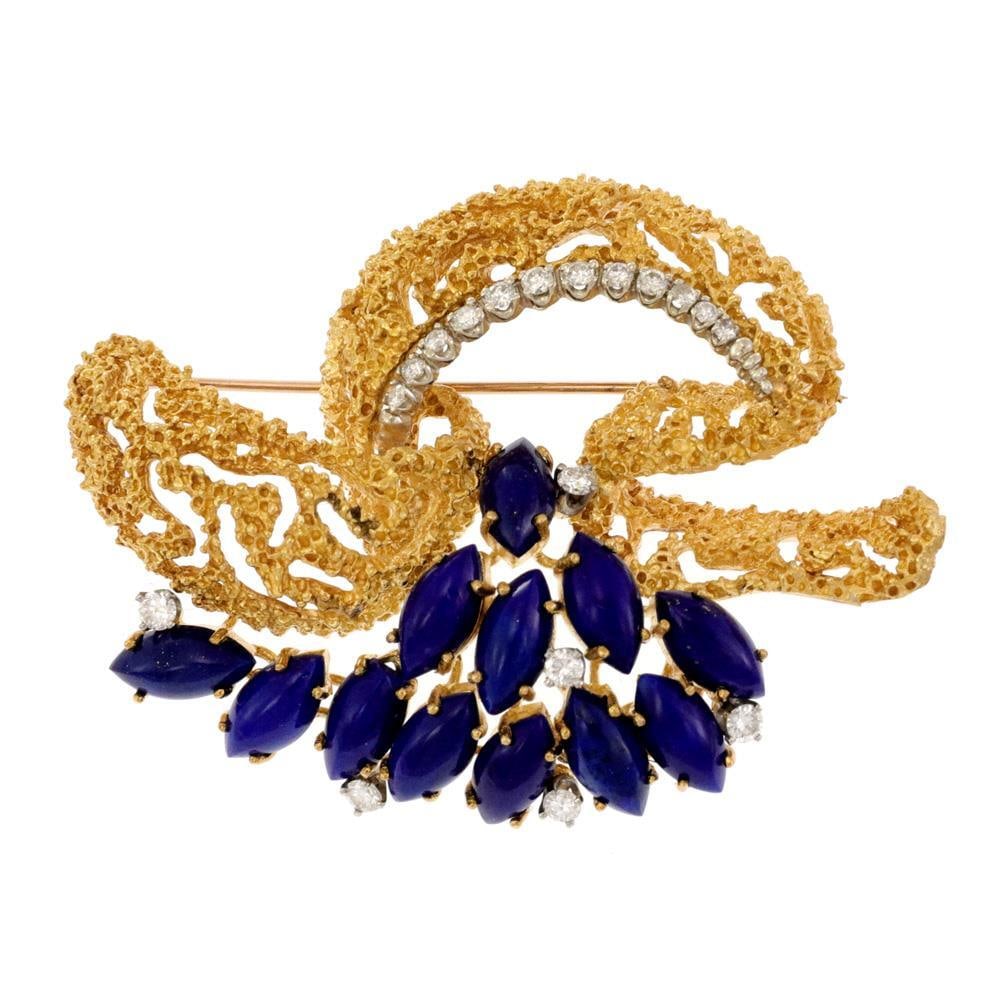 18k Yellow Gold Floral Bow Brooch Lapis Diamonds 35 Grams: 18k Yellow Gold Floral Bow Brooch Lapis Diamonds 35 Grams This elegant estate brooch is crafted from 18k yellow gold and features a textured ribbon bow design. The bow is accented with diamonds set in