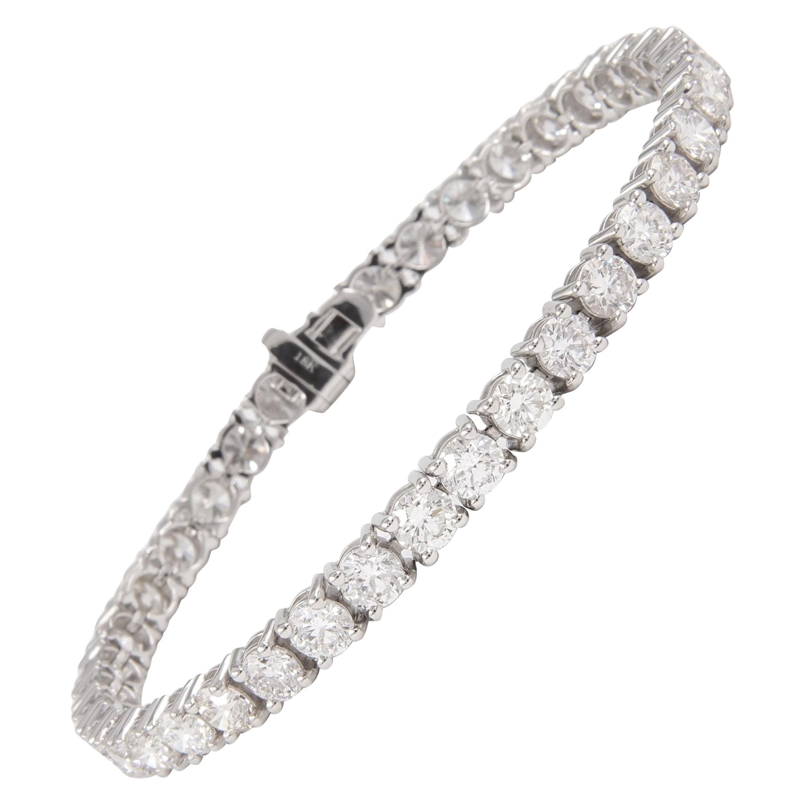 10.32ct Diamond Tennis Bracelet 18k White Gold GIA Appraised: 10.32ct Diamond Tennis Bracelet 18k White Gold GIA Appraised This exquisite and timeless diamond tennis bracelet features 38 round brilliant diamonds with a total weight of 10.32 carats. Set in luxuri