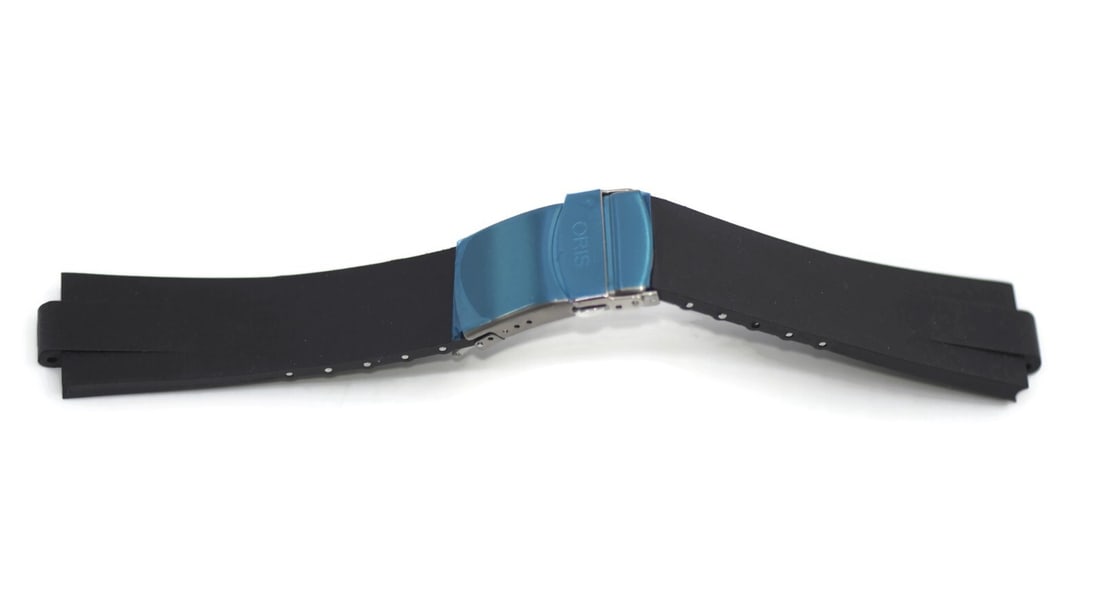 Oris Black Rubber Wristwatch Band 23.5mm Durable Strap: Oris Black Rubber Wristwatch Band 23.5mm Durable Strap Elevate your timepiece with this pre-owned Oris Black Rubber Strap, designed for comfort and style. This wristwatch band is crafted from durable 