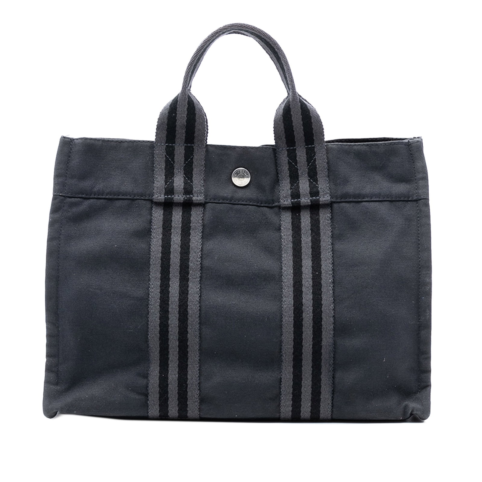 Hermes Fourre Tout PM Black Canvas Tote Bag with Snap Closure: Hermes Fourre Tout PM Black Canvas Tote Bag with Snap Closure The Hermes Canvas Fourre Tout PM is a practical tote featuring a durable canvas body, flat straps, an open top with snap closure, and an i