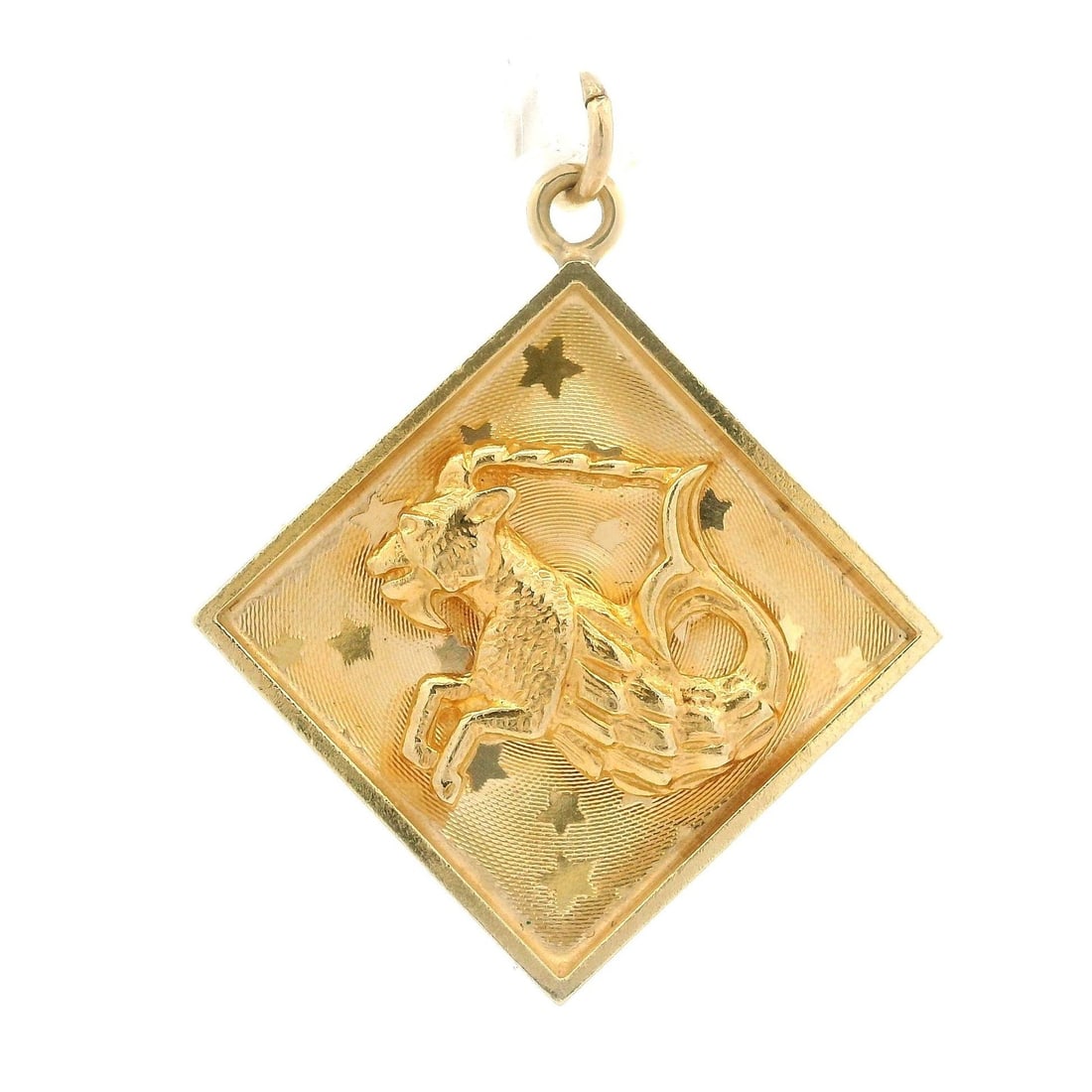 Capricorn Zodiac Pendant in Florentine Star Motif Yellow Gold: Capricorn Zodiac Pendant in Florentine Star Motif Yellow Gold This vintage Capricorn zodiac pendant is crafted from solid 13k to 14k yellow gold, featuring a Florentine finish with a stars background.