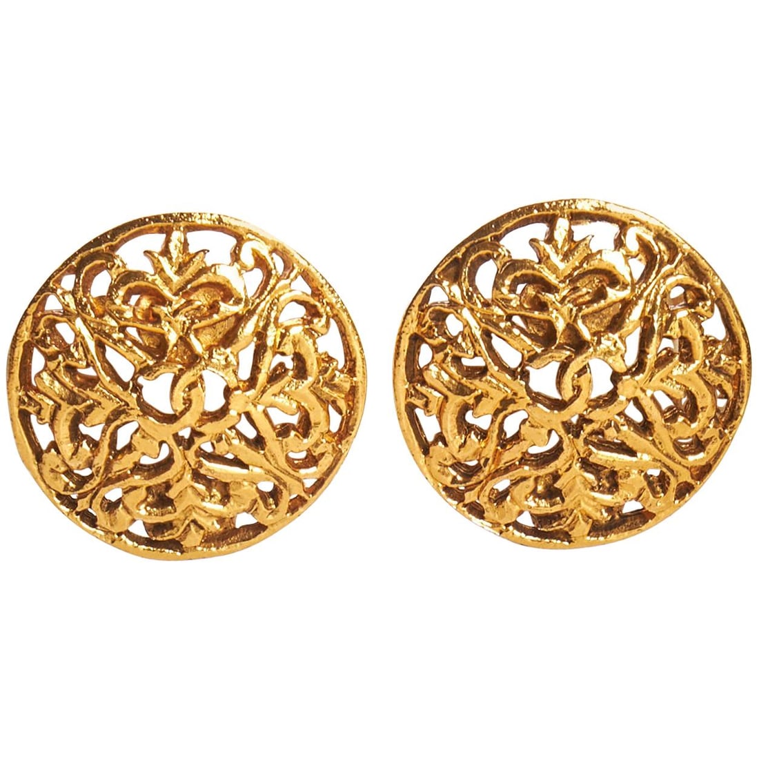 1980s Chanel Gold Tone Perforated Logo Clip Earrings Collection 26: 1980s Chanel Gold Tone Perforated Logo Clip Earrings Collection 26 These exquisite 1980's Chanel perforated logo clip earrings feature a striking round design, crafted in a luxurious gold tone. Part o