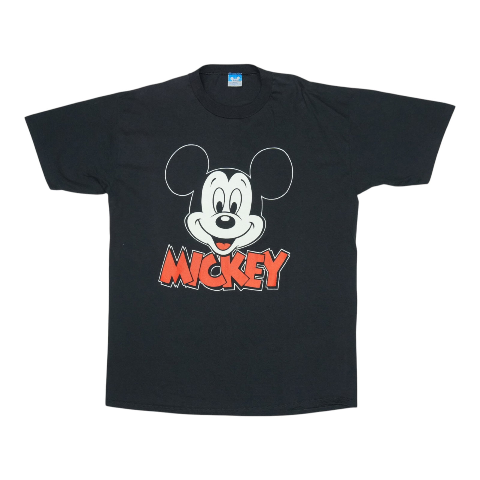 Vintage 1980s Black Mickey Mouse Disney Cotton T Shirt: Vintage 1980s Black Mickey Mouse Disney Cotton T Shirt This is an original vintage 1980s Mickey Mouse Disney shirt, featuring a classic design with no graphics on the back. Made from 100% cotton in bl