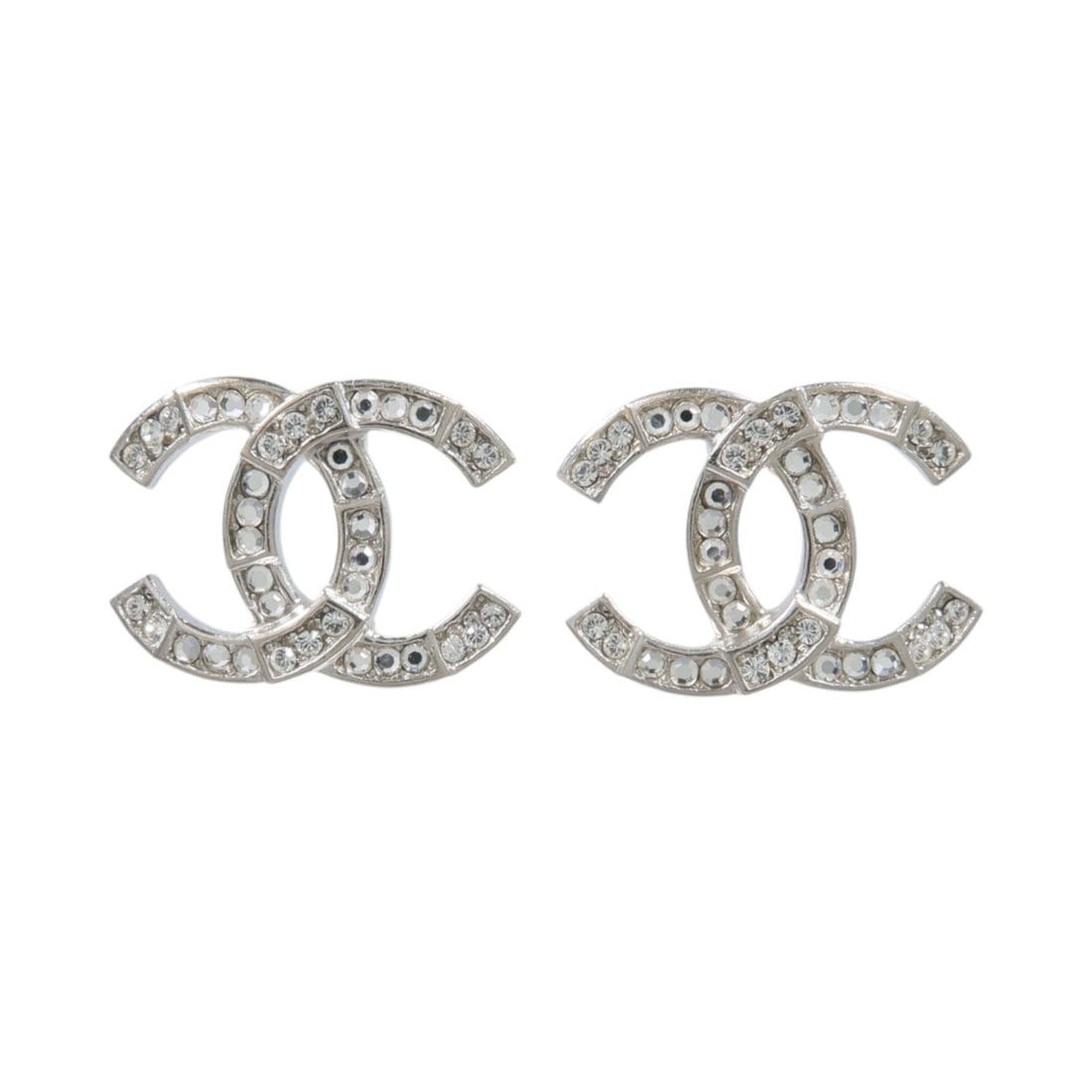 CHANEL CC Pierced Earrings Silver Tone Metal Clear: CHANEL CC Pierced Earrings Silver Tone Metal Clear CHANEL pierced CC earrings in silver-tone metal with clear accents. The earrings are described as women's regular size and come with a storage box. C