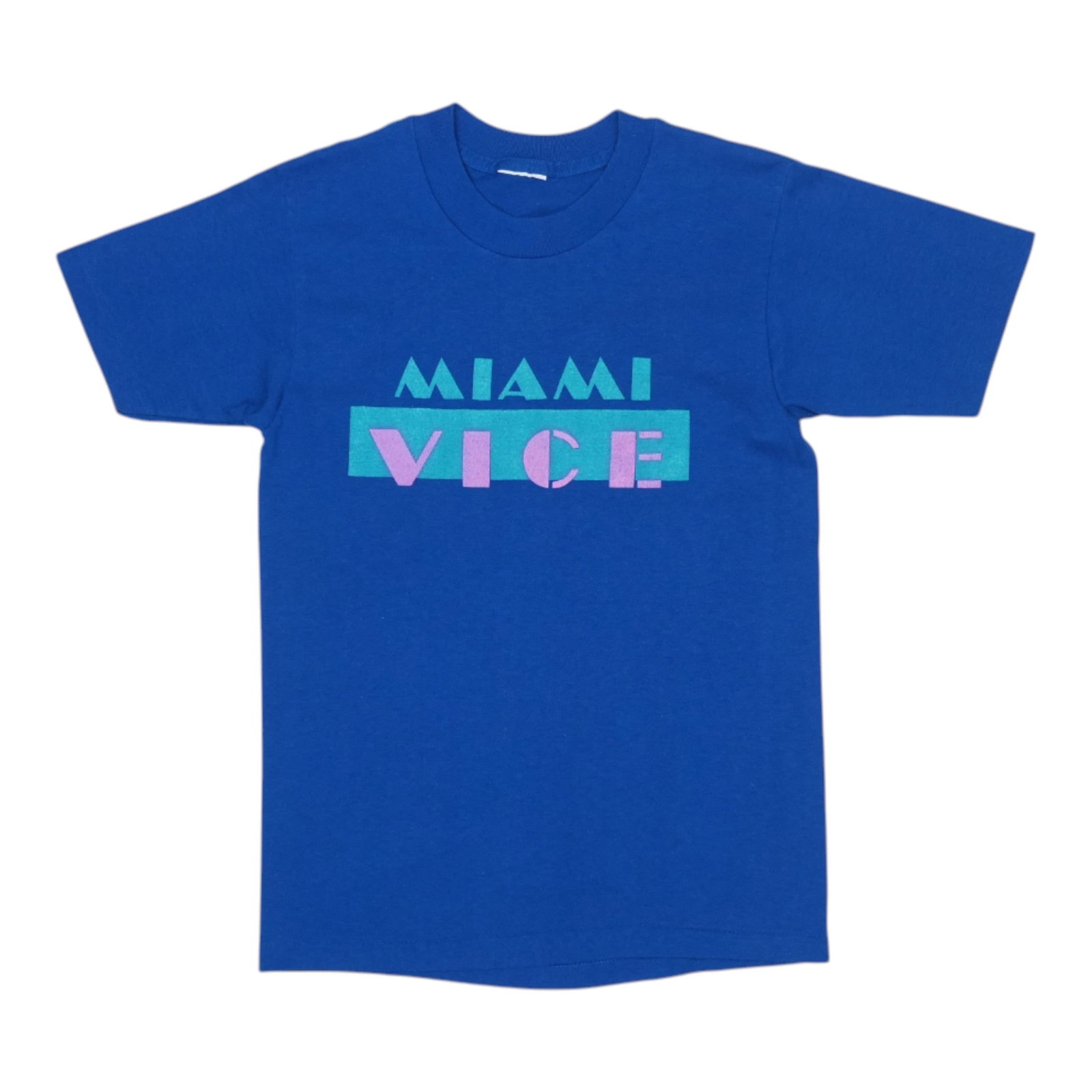Vintage 1980s Blue Poly Cotton Miami Vice Graphic Shirt: Vintage 1980s Blue Poly Cotton Miami Vice Graphic Shirt This original vintage Miami Vice shirt from the 1980s is made from a comfortable 50/50 poly-cotton blend in blue. It features no back graphics a