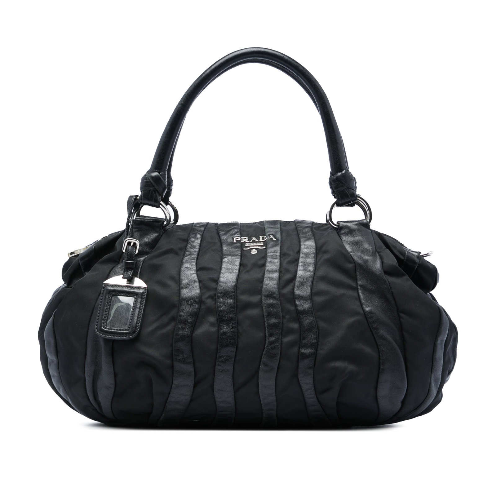 Prada Tessuto Nappa Waves Black Nylon Leather Zip Top Handbag: Prada Tessuto Nappa Waves Black Nylon Leather Zip Top Handbag Prada Tessuto Nappa Waves Handbag in black, crafted with a nylon and nappa leather body. It features rolled leather handles, a top zip clo
