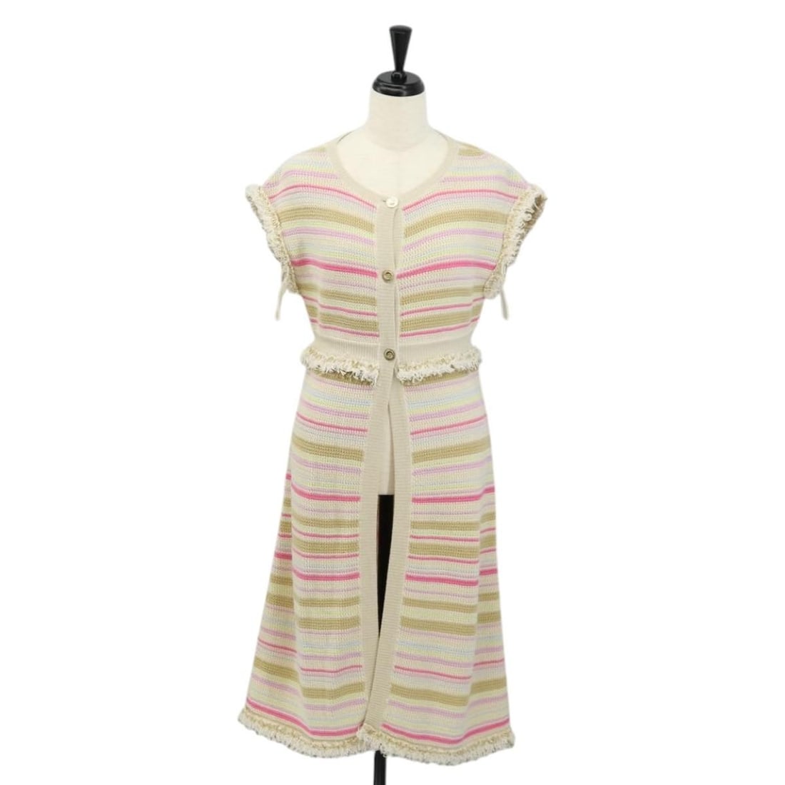 CHANEL Beige Wool Long Dress Shirt Authenticated 136572M: CHANEL Beige Wool Long Dress Shirt Authenticated 136572M This elegant CHANEL long dress shirt is crafted from luxurious beige wool, showcasing a sophisticated yet versatile style. Made in France, this