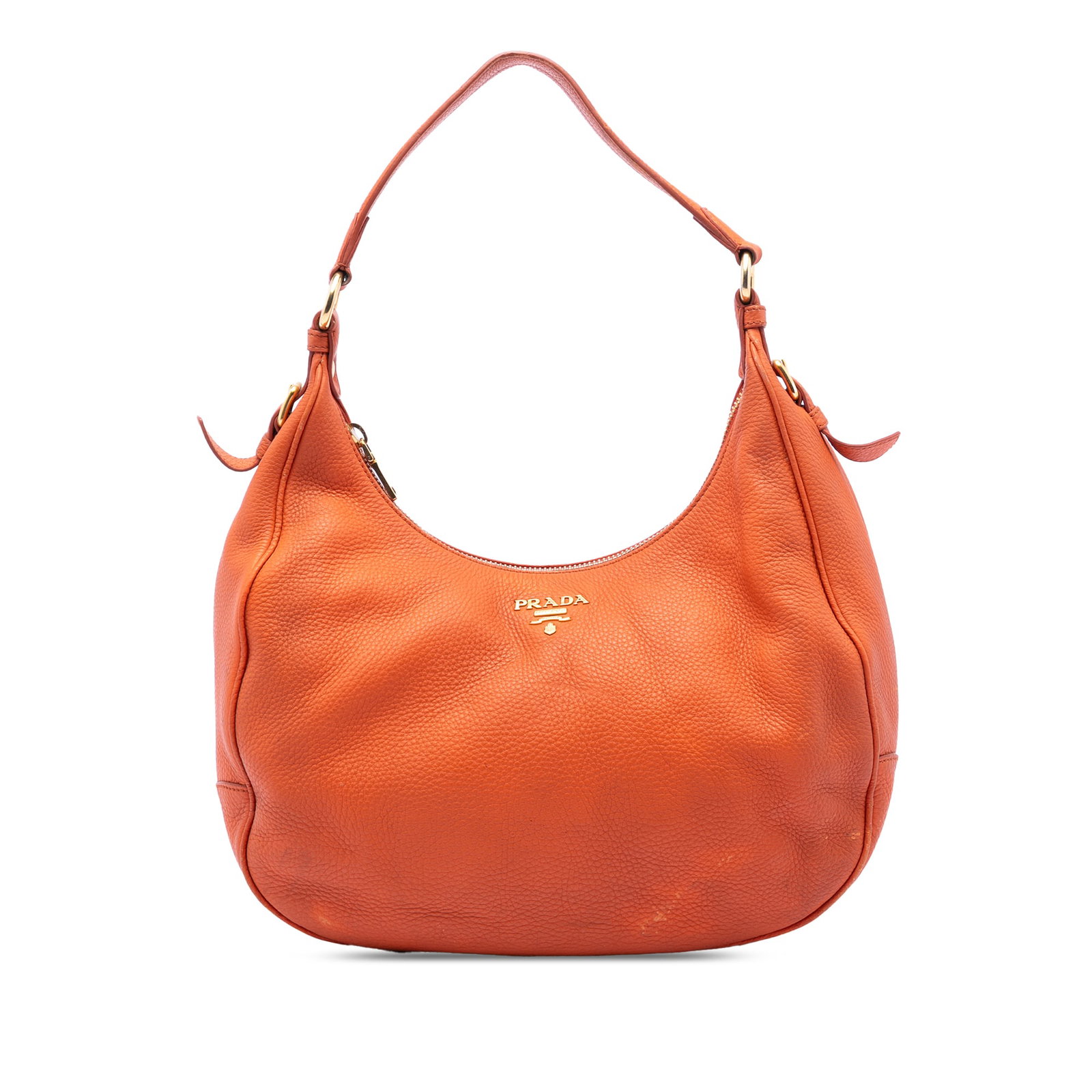 Prada Vitello Daino Orange Leather Shoulder Bag with Zip Closure: Prada Vitello Daino Orange Leather Shoulder Bag with Zip Closure This Prada Vitello Daino Zip Top Hobo is crafted from orange leather and features a flat leather shoulder strap, top zip closure, and i
