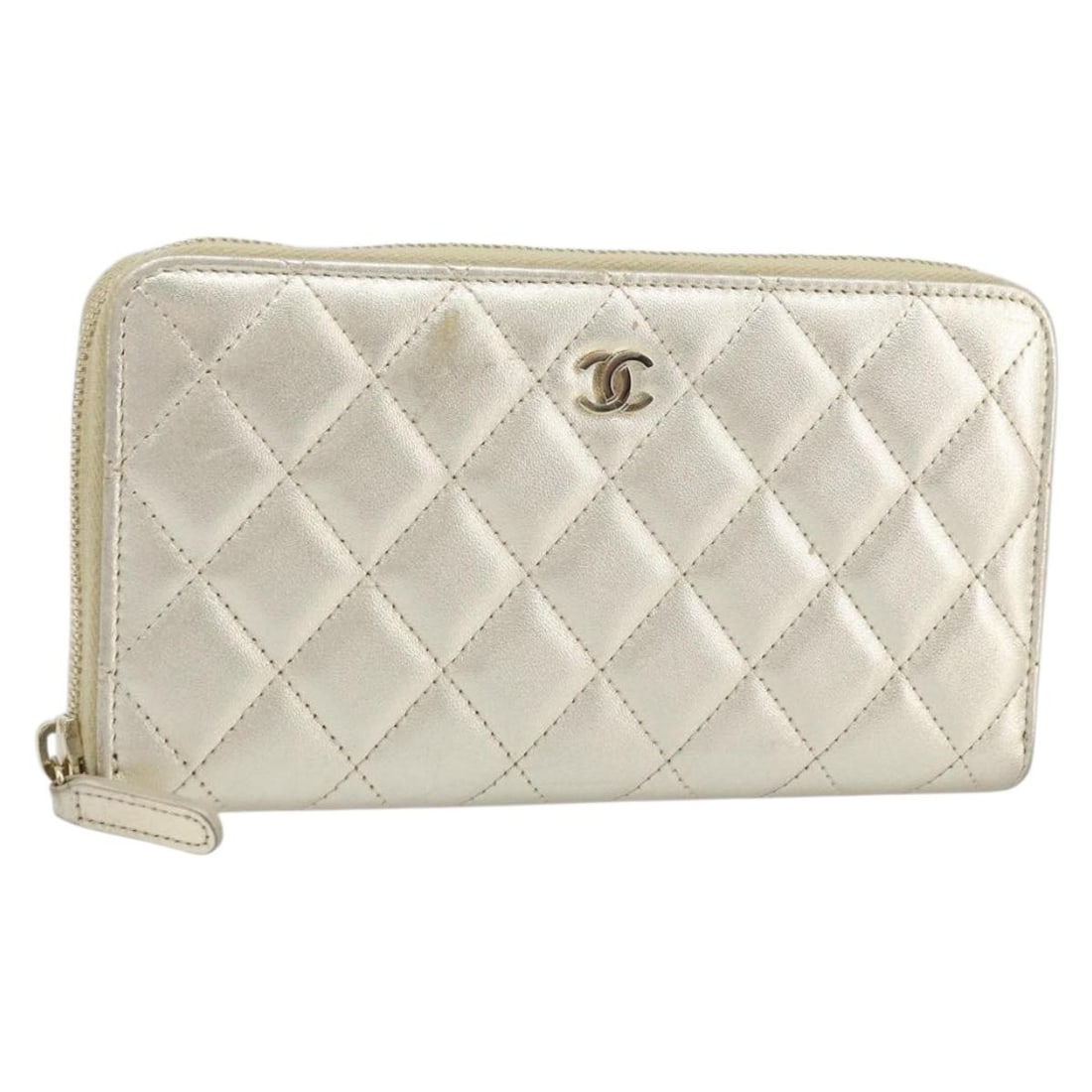 Chanel Lambskin Matelasse Gold Tone Long Wallet for Women: Chanel Lambskin Matelasse Gold Tone Long Wallet for Women This CHANEL Matelasse long wallet is crafted from luxurious lambskin leather in a gold tone. Designed for women, it features the signature CC 