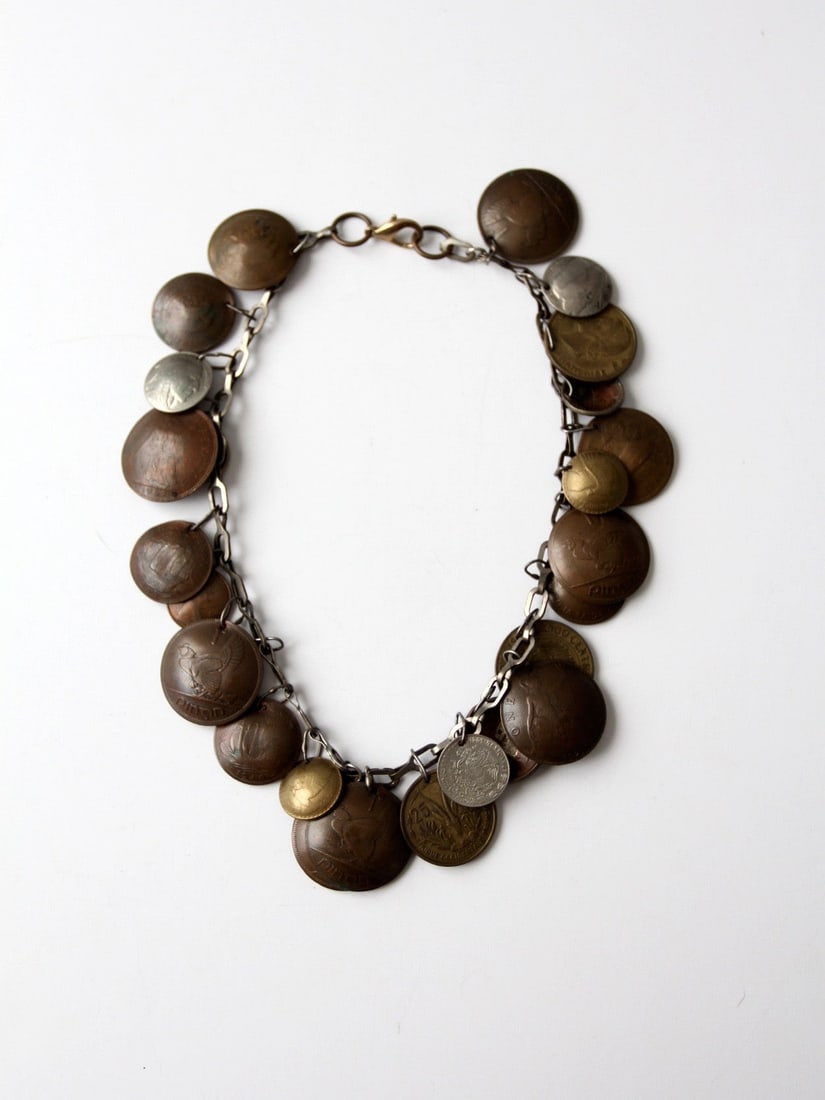 Vintage World Coin Statement Necklace 16.5 Inches Unique Antique Collection: Vintage World Coin Statement Necklace 16.5 Inches Unique Antique Collection Discover a unique piece of history with this Vintage World Coin Necklace. This grand statement necklace showcases a collecti