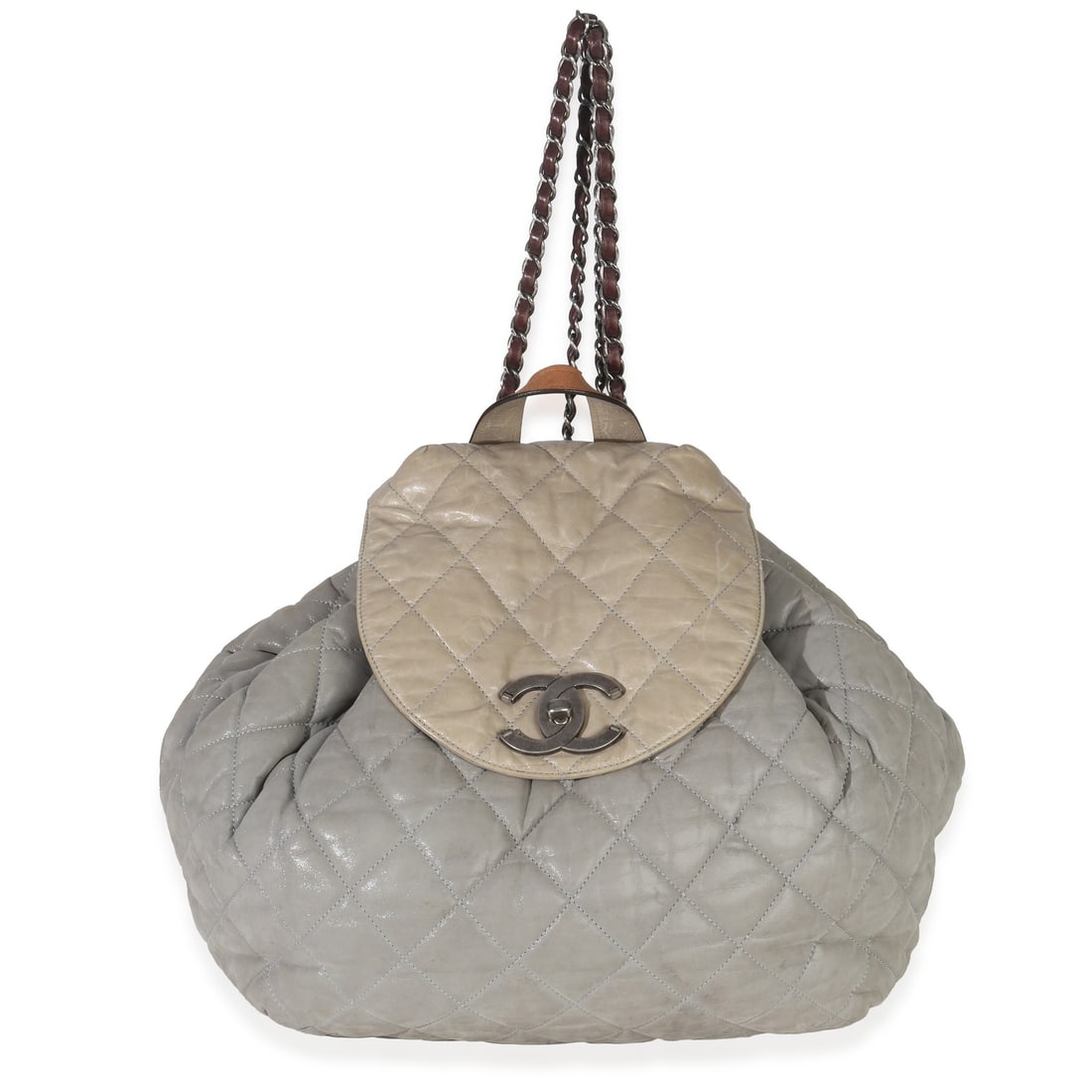 Chanel In The Mix Gray Leather Backpack Drawstring Turnlock: Chanel In The Mix Gray Leather Backpack Drawstring Turnlock Pre-owned Chanel In The Mix backpack in gray quilted calfskin with a fabric lining and drawstring plus turnlock closure. This unisex backpac
