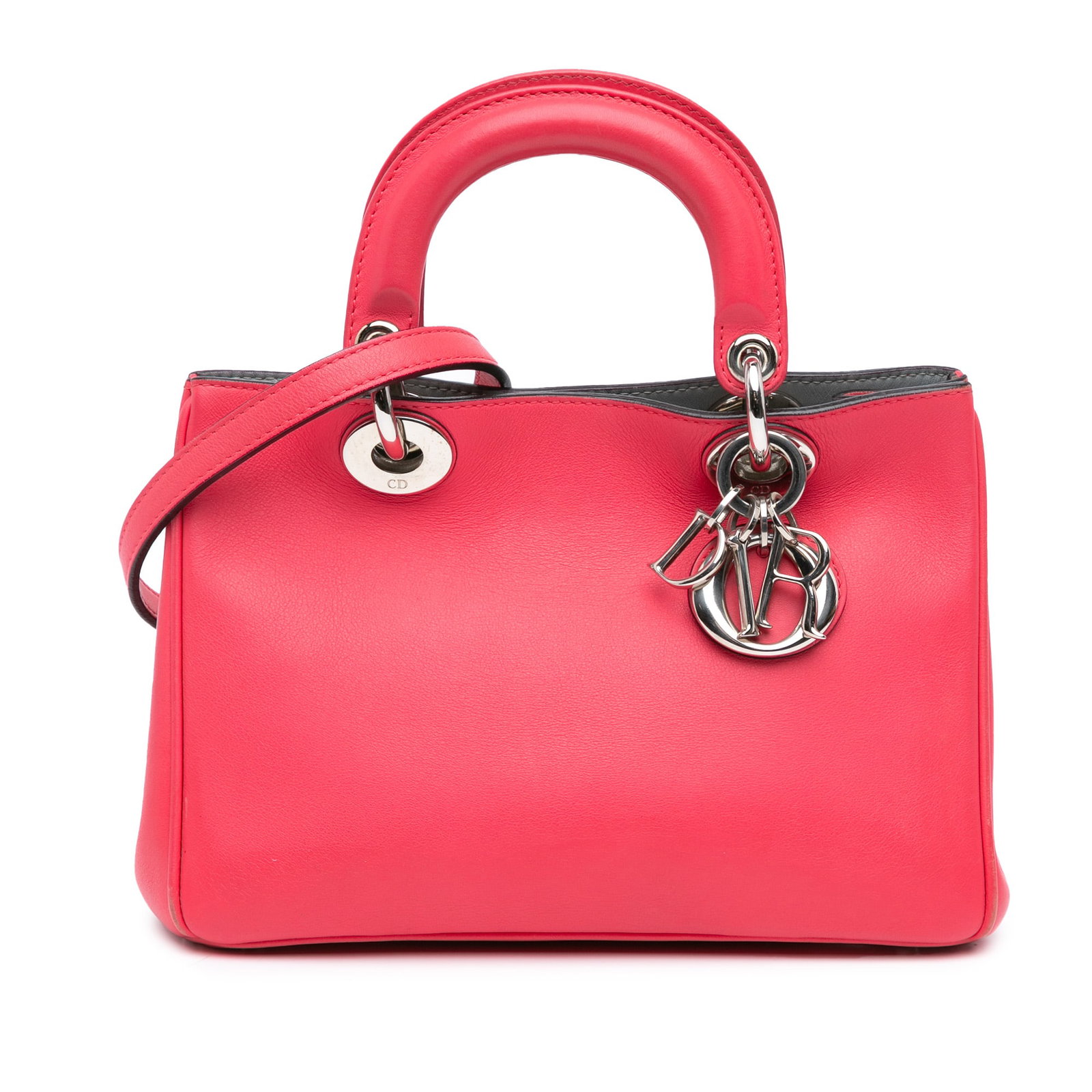 Dior Diorissimo Pink Leather Satchel with Strap: Dior Diorissimo Pink Leather Satchel with Strap This Small Diorissimo Satchel is crafted from pink leather and features flat leather top handles and a detachable, adjustable leather shoulder strap. Th