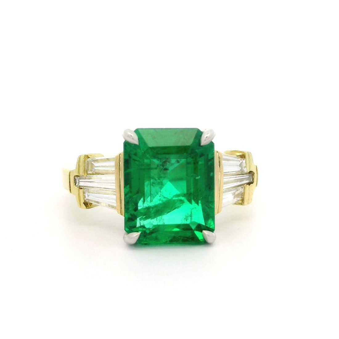 18k Yellow Gold Platinum GIA Emerald Baguette Diamond Ring 4.1ctw: 18k Yellow Gold Platinum GIA Emerald Baguette Diamond Ring 4.1ctw This exquisite cocktail ring features a stunning natural emerald and diamond combination, showcasing an octagonal step cut emerald wei