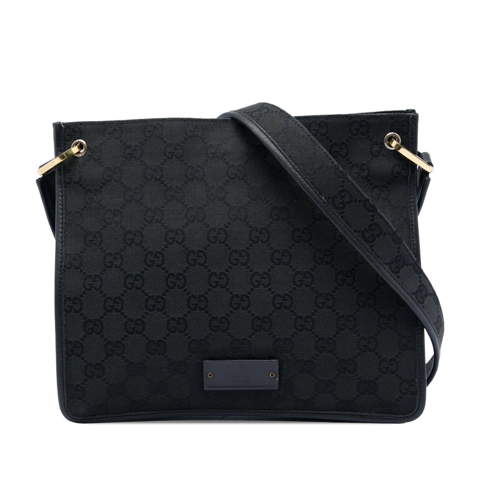 Gucci GG Canvas Black Crossbody Bag with Leather Trim: Gucci GG Canvas Black Crossbody Bag with Leather Trim Gucci GG Canvas Crossbody bag from Italy, crafted with a canvas body and leather trim. It features an adjustable flat strap, an open top with magn
