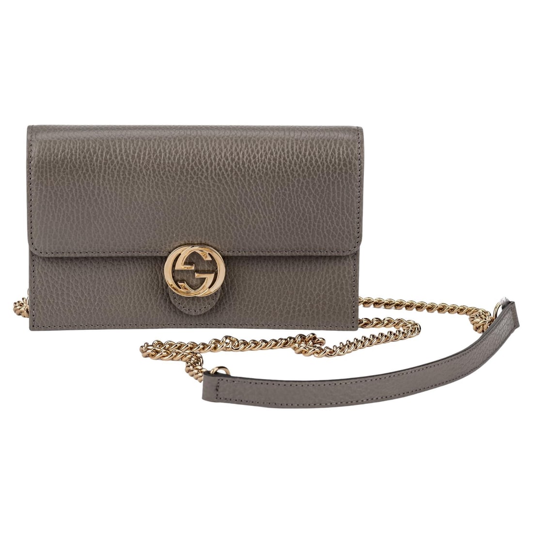 Gucci Grey Pebbled Leather Clutch Crossbody with GG Logo: Gucci Grey Pebbled Leather Clutch Crossbody with GG Logo This elegant Gucci Grey Leather Clutch/Crossbody is a versatile accessory designed for the modern individual. Crafted from high-quality pebbled